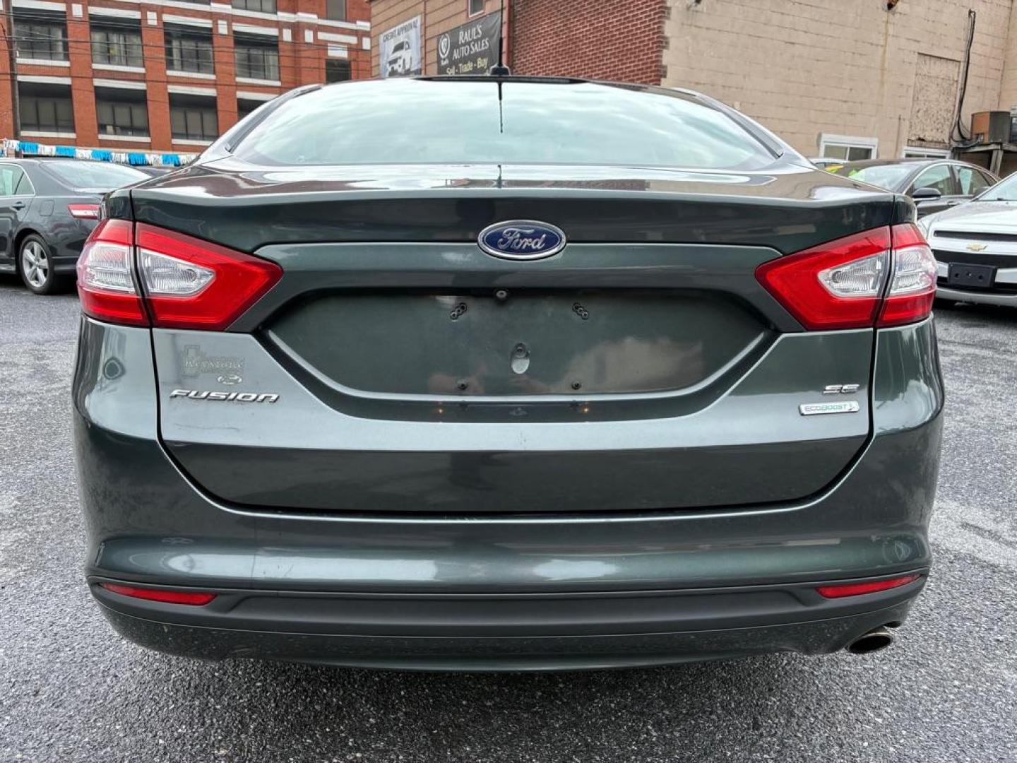 2015 GREEN FORD FUSION SE (3FA6P0HD4FR) with an 1.5L engine, Automatic transmission, located at 117 North Cameron Street, Harrisburg, PA, 17101, (717) 963-8962, 40.267021, -76.875351 - WE FINANCE!!! MOST vehicles are available for financing. Good Credit/ Challenged Credit/ No Credit - ALL Trade-Ins Welcomed!!! APPLY ONLINE or CALL us TODAY Please call us to discuss your cash and/or financing options. Thanks for checking our inventory! We're here to help.- Photo#3