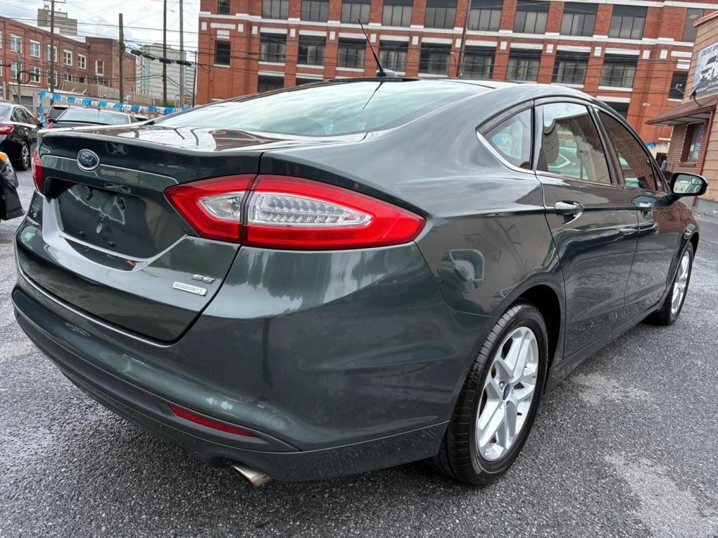 2015 GREEN FORD FUSION SE (3FA6P0HD4FR) with an 1.5L engine, Automatic transmission, located at 117 North Cameron Street, Harrisburg, PA, 17101, (717) 963-8962, 40.267021, -76.875351 - WE FINANCE!!! MOST vehicles are available for financing. Good Credit/ Challenged Credit/ No Credit - ALL Trade-Ins Welcomed!!! APPLY ONLINE or CALL us TODAY Please call us to discuss your cash and/or financing options. Thanks for checking our inventory! We're here to help.- Photo#4