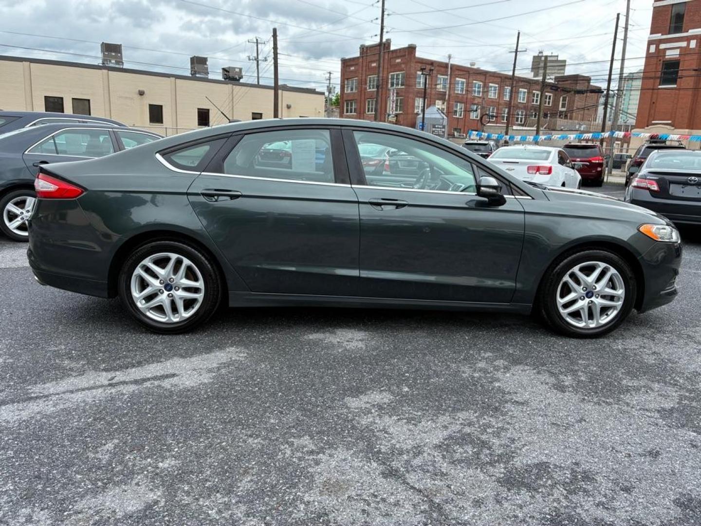 2015 GREEN FORD FUSION SE (3FA6P0HD4FR) with an 1.5L engine, Automatic transmission, located at 117 North Cameron Street, Harrisburg, PA, 17101, (717) 963-8962, 40.267021, -76.875351 - WE FINANCE!!! MOST vehicles are available for financing. Good Credit/ Challenged Credit/ No Credit - ALL Trade-Ins Welcomed!!! APPLY ONLINE or CALL us TODAY Please call us to discuss your cash and/or financing options. Thanks for checking our inventory! We're here to help.- Photo#5