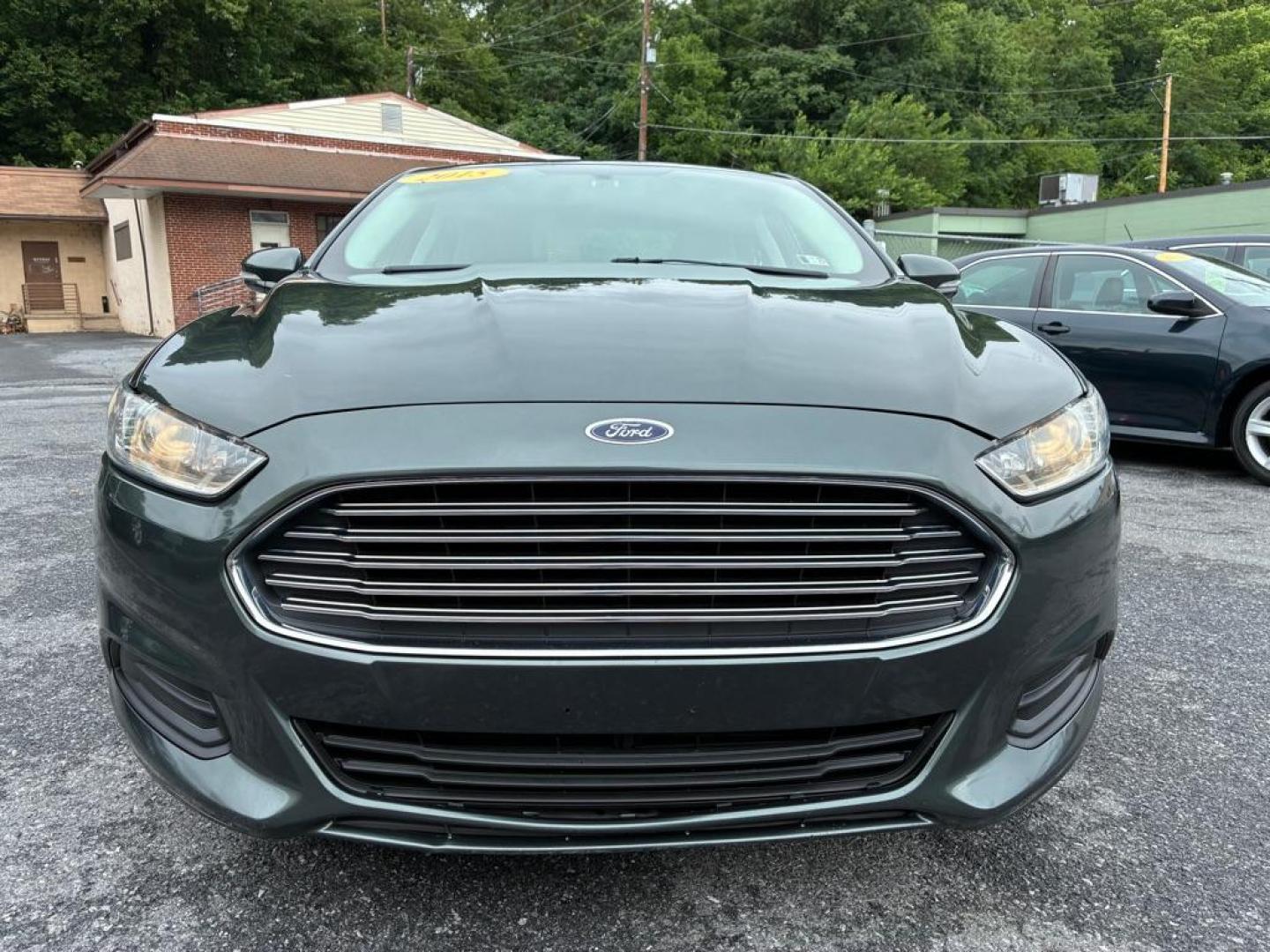2015 GREEN FORD FUSION SE (3FA6P0HD4FR) with an 1.5L engine, Automatic transmission, located at 117 North Cameron Street, Harrisburg, PA, 17101, (717) 963-8962, 40.267021, -76.875351 - WE FINANCE!!! MOST vehicles are available for financing. Good Credit/ Challenged Credit/ No Credit - ALL Trade-Ins Welcomed!!! APPLY ONLINE or CALL us TODAY Please call us to discuss your cash and/or financing options. Thanks for checking our inventory! We're here to help.- Photo#7