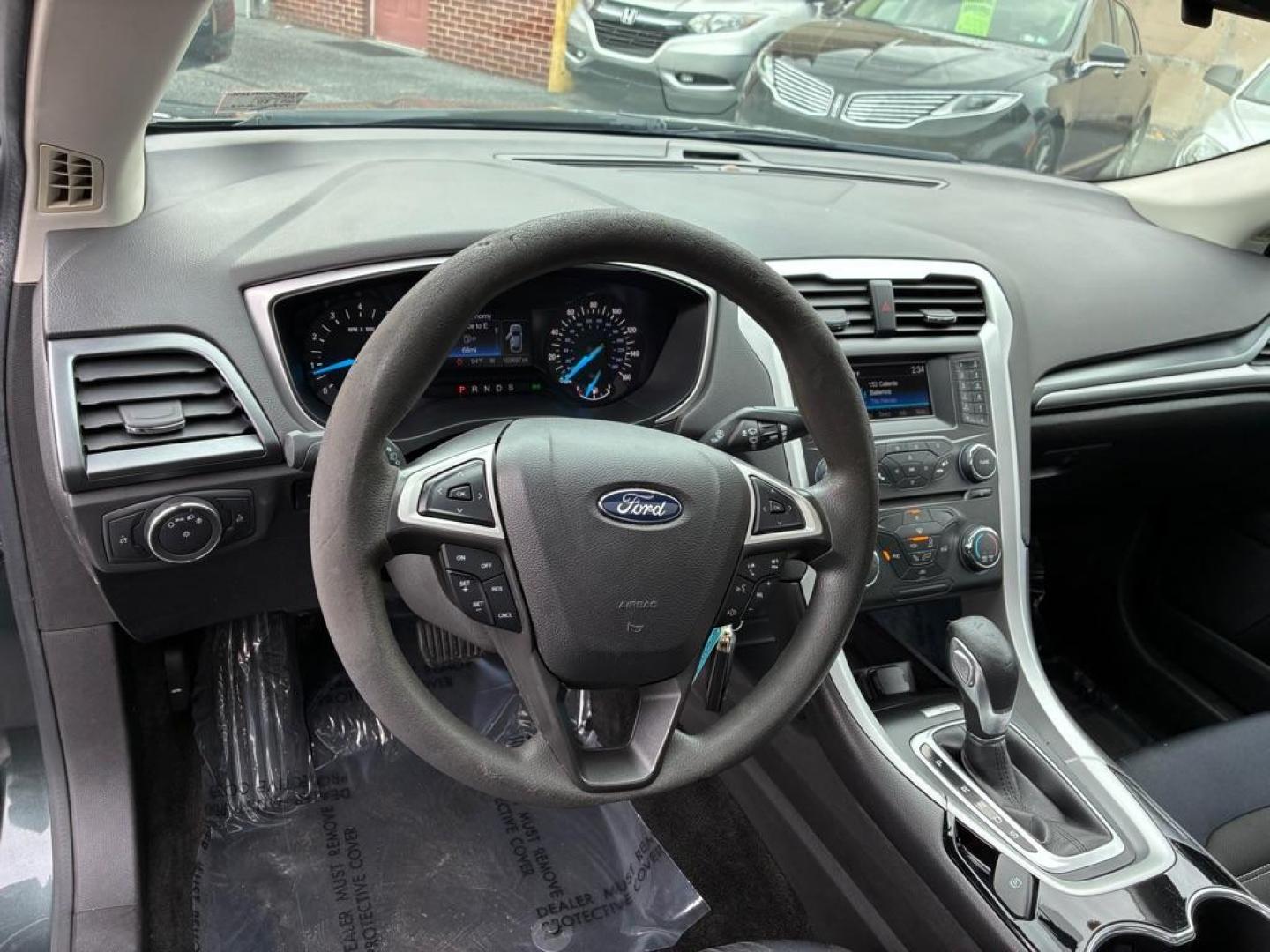 2015 GREEN FORD FUSION SE (3FA6P0HD4FR) with an 1.5L engine, Automatic transmission, located at 117 North Cameron Street, Harrisburg, PA, 17101, (717) 963-8962, 40.267021, -76.875351 - WE FINANCE!!! MOST vehicles are available for financing. Good Credit/ Challenged Credit/ No Credit - ALL Trade-Ins Welcomed!!! APPLY ONLINE or CALL us TODAY Please call us to discuss your cash and/or financing options. Thanks for checking our inventory! We're here to help.- Photo#14
