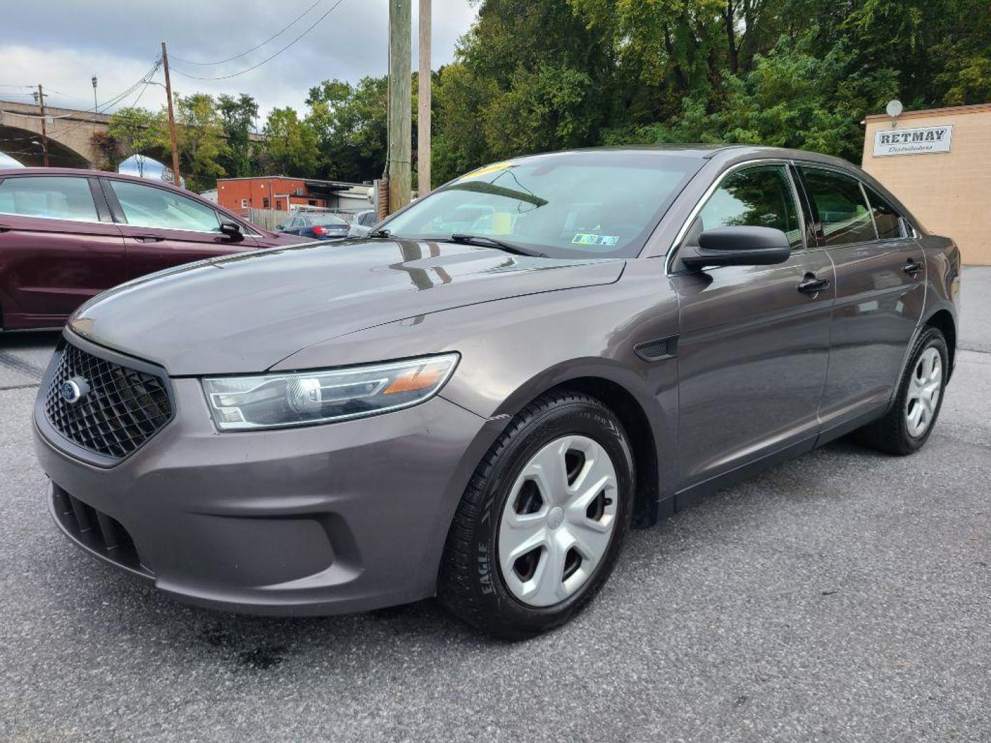 2015 GRAY FORD TAURUS POLICE INTERCEPTOR (1FAHP2MK4FG) with an 3.7L engine, Automatic transmission, located at 117 North Cameron Street, Harrisburg, PA, 17101, (717) 963-8962, 40.267021, -76.875351 - WE FINANCE!!! Good Credit/ Bad Credit/ No Credit - ALL Trade-Ins Welcomed!!! ***Guaranteed Credit Approval*** APPLY ONLINE or CALL us TODAY ;) Please call us to discuss your cash and financing options. - Photo#0
