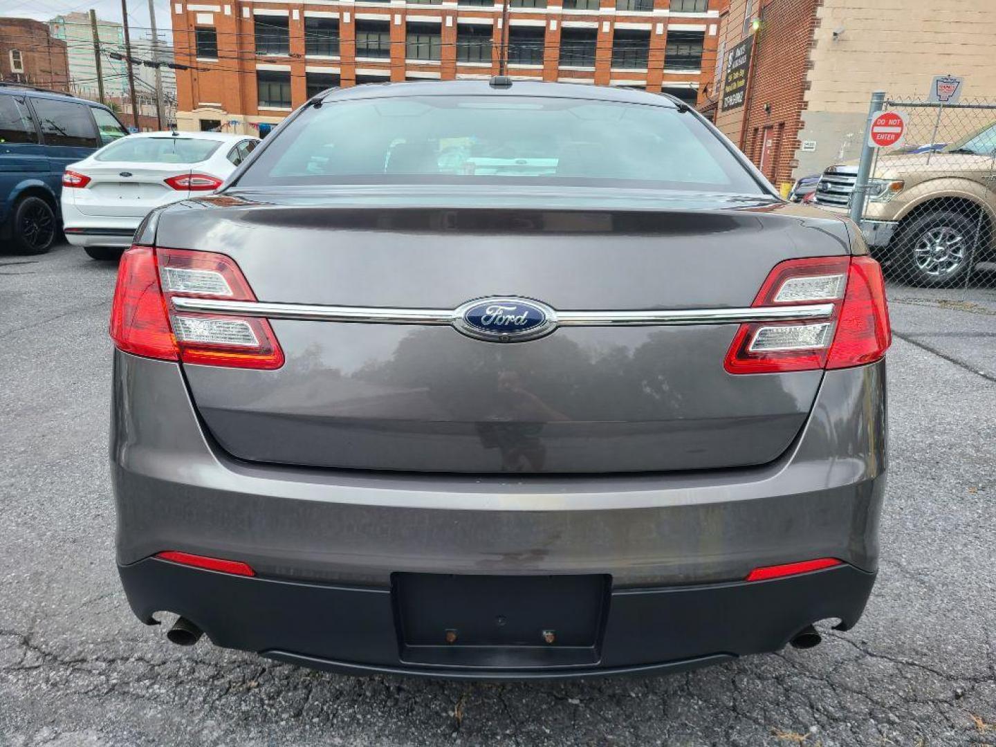 2015 GRAY FORD TAURUS POLICE INTERCEPTOR (1FAHP2MK4FG) with an 3.7L engine, Automatic transmission, located at 117 North Cameron Street, Harrisburg, PA, 17101, (717) 963-8962, 40.267021, -76.875351 - WE FINANCE!!! Good Credit/ Bad Credit/ No Credit - ALL Trade-Ins Welcomed!!! ***Guaranteed Credit Approval*** APPLY ONLINE or CALL us TODAY ;) Please call us to discuss your cash and financing options. - Photo#2