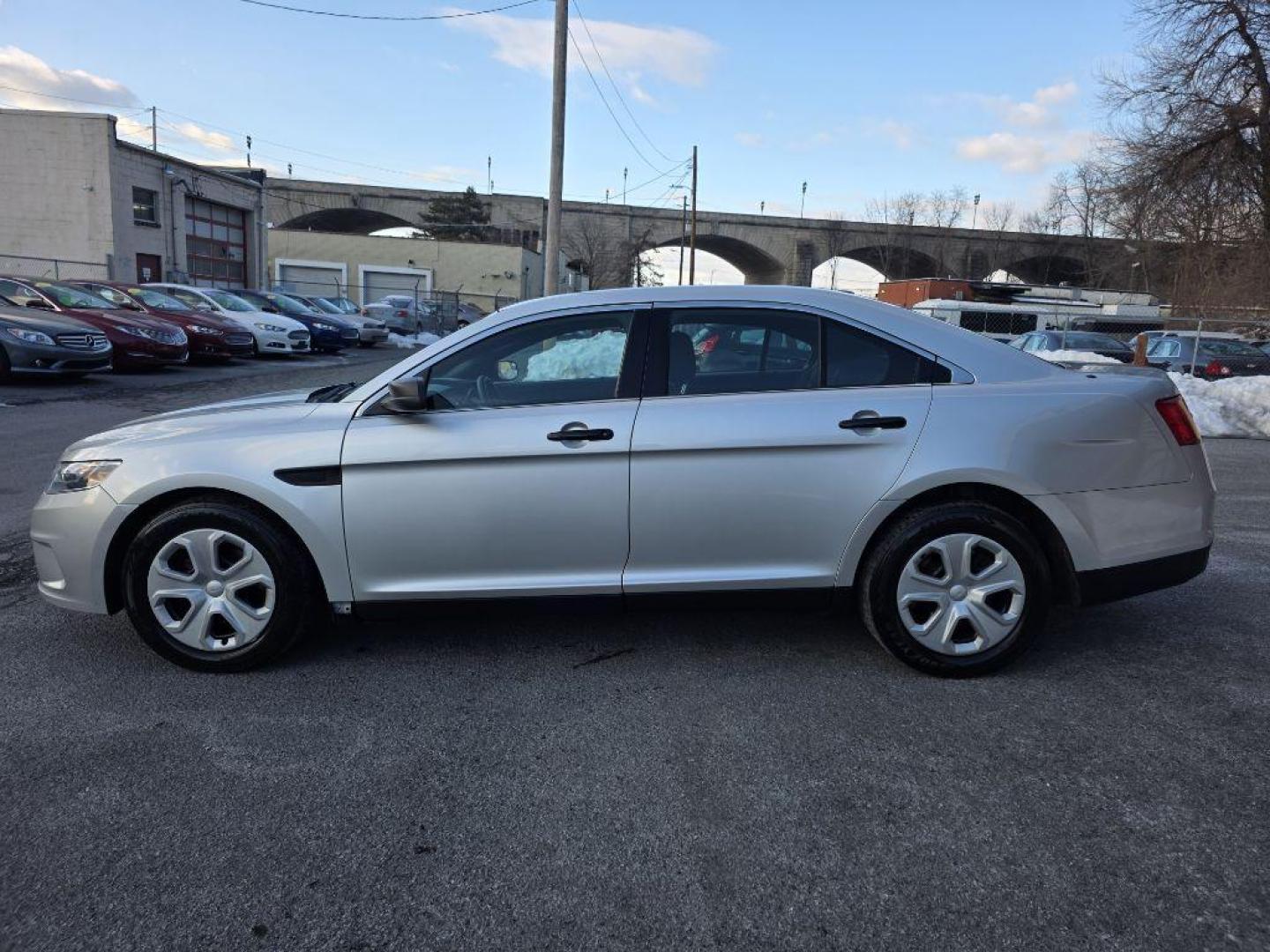 2015 SILVER FORD TAURUS POLICE INTERCEPTOR (1FAHP2MKXFG) with an 3.7L engine, Automatic transmission, located at 117 North Cameron Street, Harrisburg, PA, 17101, (717) 963-8962, 40.267021, -76.875351 - WE FINANCE!!! Good Credit/ Challenged Credit/ No Credit - ALL Trade-Ins Welcomed!!! APPLY ONLINE or CALL us TODAY ;) Please call us to discuss your cash and/or financing options. - Photo#1