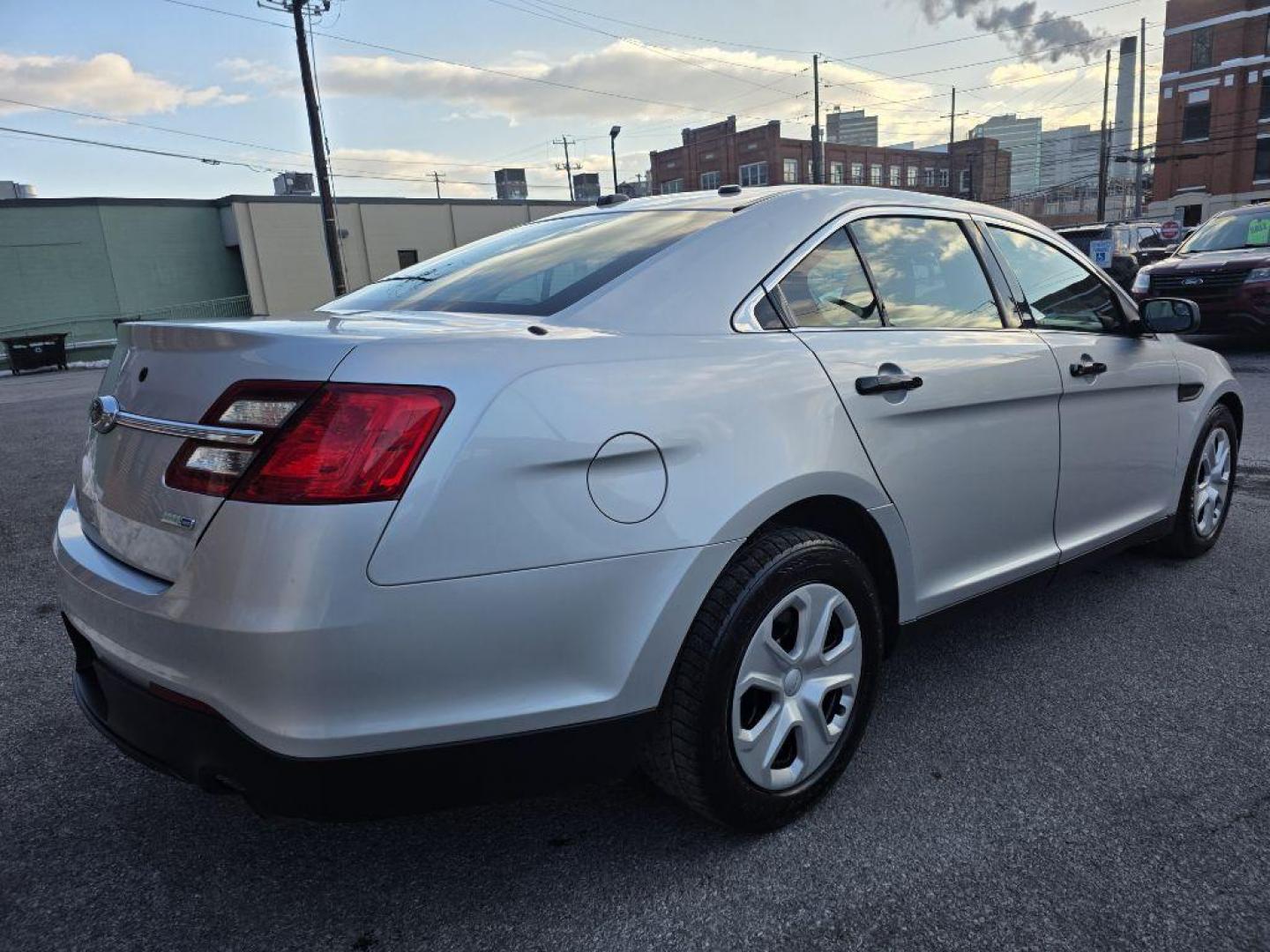 2015 SILVER FORD TAURUS POLICE INTERCEPTOR (1FAHP2MKXFG) with an 3.7L engine, Automatic transmission, located at 117 North Cameron Street, Harrisburg, PA, 17101, (717) 963-8962, 40.267021, -76.875351 - WE FINANCE!!! Good Credit/ Challenged Credit/ No Credit - ALL Trade-Ins Welcomed!!! APPLY ONLINE or CALL us TODAY ;) Please call us to discuss your cash and/or financing options. - Photo#4