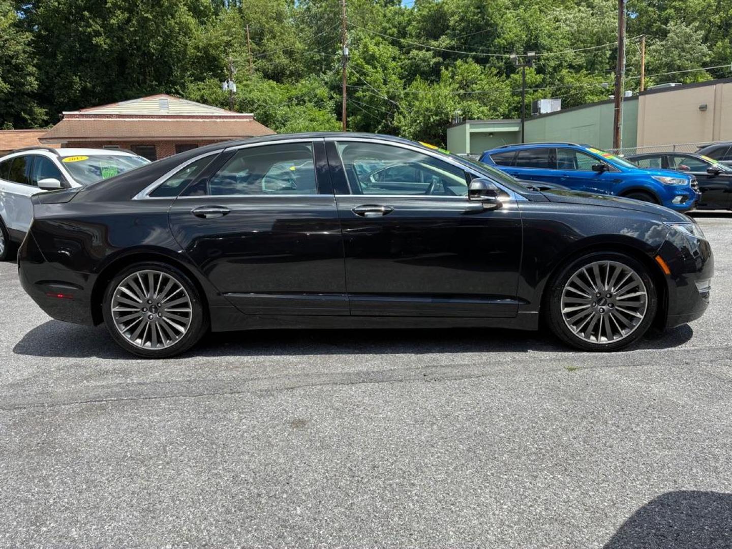 2015 GREEN LINCOLN MKZ HYBRID (3LN6L2LU0FR) with an 2.0L engine, Continuously Variable transmission, located at 117 North Cameron Street, Harrisburg, PA, 17101, (717) 963-8962, 40.267021, -76.875351 - WE FINANCE!!! MOST vehicles are available for financing. Good Credit/ Challenged Credit/ No Credit - ALL Trade-Ins Welcomed!!! APPLY ONLINE or CALL us TODAY Please call us to discuss your cash and/or financing options. Thanks for checking our inventory! We're here to help. - Photo#5