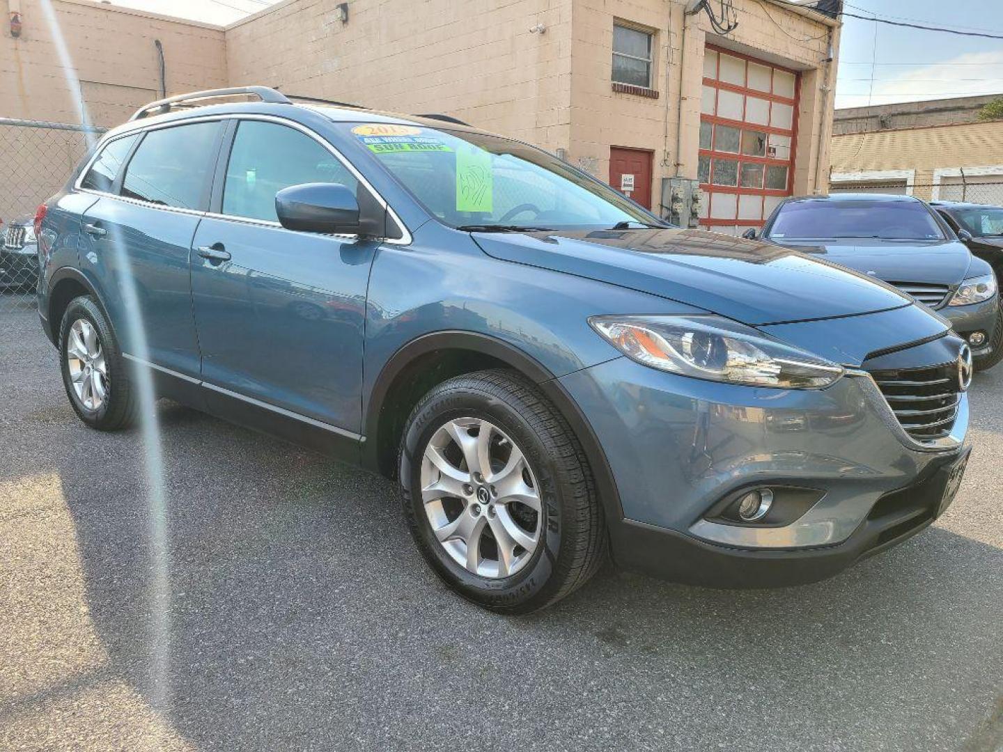 2015 BLUE MAZDA CX-9 TOURING (JM3TB3CV9F0) with an 3.7L engine, Automatic transmission, located at 117 North Cameron Street, Harrisburg, PA, 17101, (717) 963-8962, 40.267021, -76.875351 - Photo#2