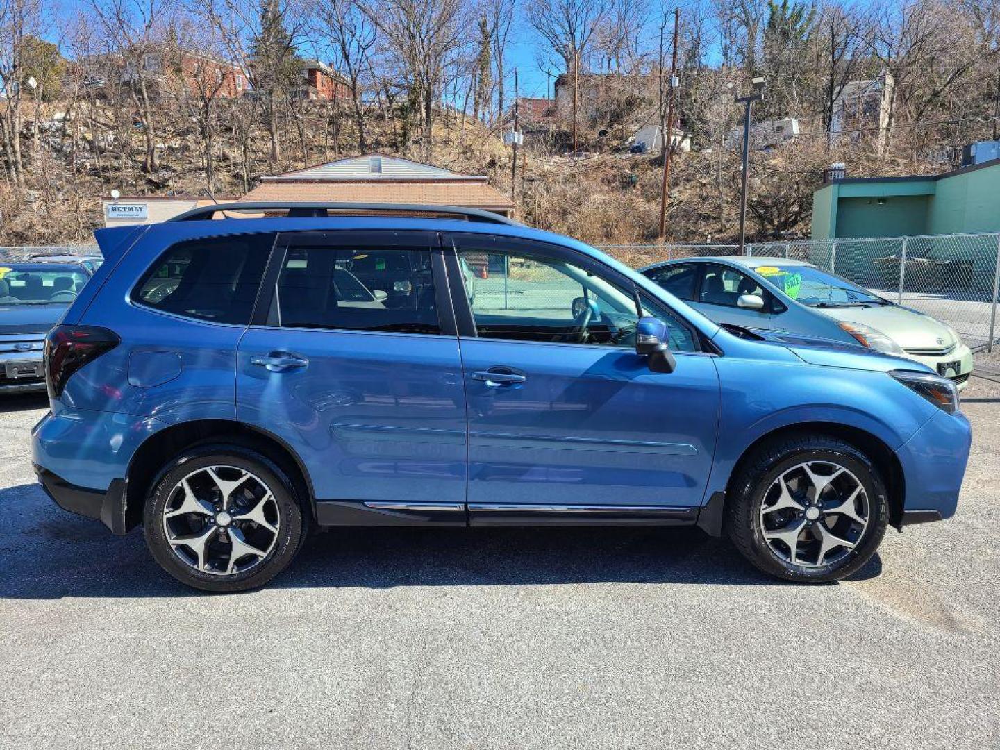 2015 BLUE SUBARU FORESTER 2.0XT TOURING (JF2SJGWC1FH) with an 2.0L engine, Continuously Variable transmission, located at 7981 Paxton Street, Harrisburg, PA, 17111, (717) 561-2926, 40.261490, -76.749229 - WE FINANCE!!! Good Credit/ Bad Credit/ No Credit - ALL Trade-Ins Welcomed!!! ***Guaranteed Credit Approval*** APPLY ONLINE or CALL us TODAY ;) Internet Prices and Marketplace Prices are SPECIAL discounted ***CASH DEALS*** Retail Prices are higher. Please call us to discuss your cash and finan - Photo#7