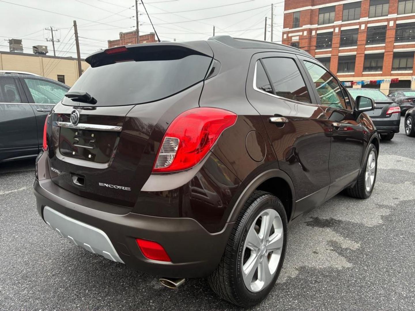2016 BROWN BUICK ENCORE BASE (KL4CJASB1GB) with an 1.4L engine, Automatic transmission, located at 117 North Cameron Street, Harrisburg, PA, 17101, (717) 963-8962, 40.267021, -76.875351 - Photo#4