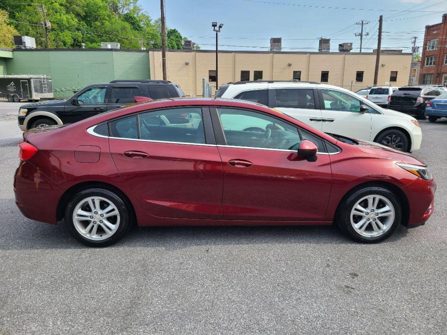 2016 RED CHEVROLET CRUZE LT (1G1BE5SM0G7) with an 1.4L engine, Automatic transmission, located at 7981 Paxton Street, Harrisburg, PA, 17111, (717) 561-2926, 40.261490, -76.749229 - Photo#3