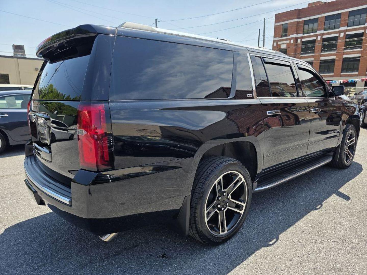 2016 BLACK CHEVROLET SUBURBAN 1500 LTZ (1GNSKJKC9GR) with an 5.3L engine, Automatic transmission, located at 117 North Cameron Street, Harrisburg, PA, 17101, (717) 963-8962, 40.267021, -76.875351 - WE FINANCE!!! MOST vehicles are available for financing. Good Credit/ Challenged Credit/ No Credit - ALL Trade-Ins Welcomed!!! APPLY ONLINE or CALL us TODAY Please call us to discuss your cash and/or financing options. Thanks for checking our inventory! We're here to help. - Photo#4