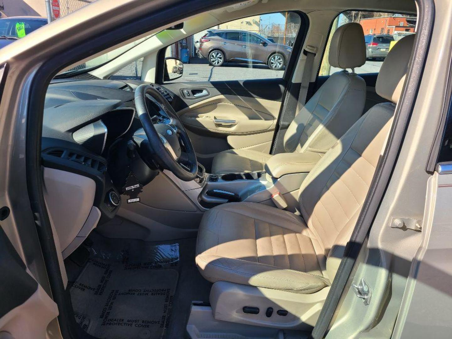 2016 TAN FORD C-MAX PREMIUM SEL (1FADP5CU9GL) with an 2.0L engine, Continuously Variable transmission, located at 7981 Paxton Street, Harrisburg, PA, 17111, (717) 561-2926, 40.261490, -76.749229 - WE FINANCE!!! Good Credit/ Bad Credit/ No Credit - ALL Trade-Ins Welcomed!!! ***Guaranteed Credit Approval*** APPLY ONLINE or CALL us TODAY ;) Internet Prices and Marketplace Prices are SPECIAL discounted ***CASH DEALS*** Retail Prices are higher. Please call us to discuss your cash and finan - Photo#13