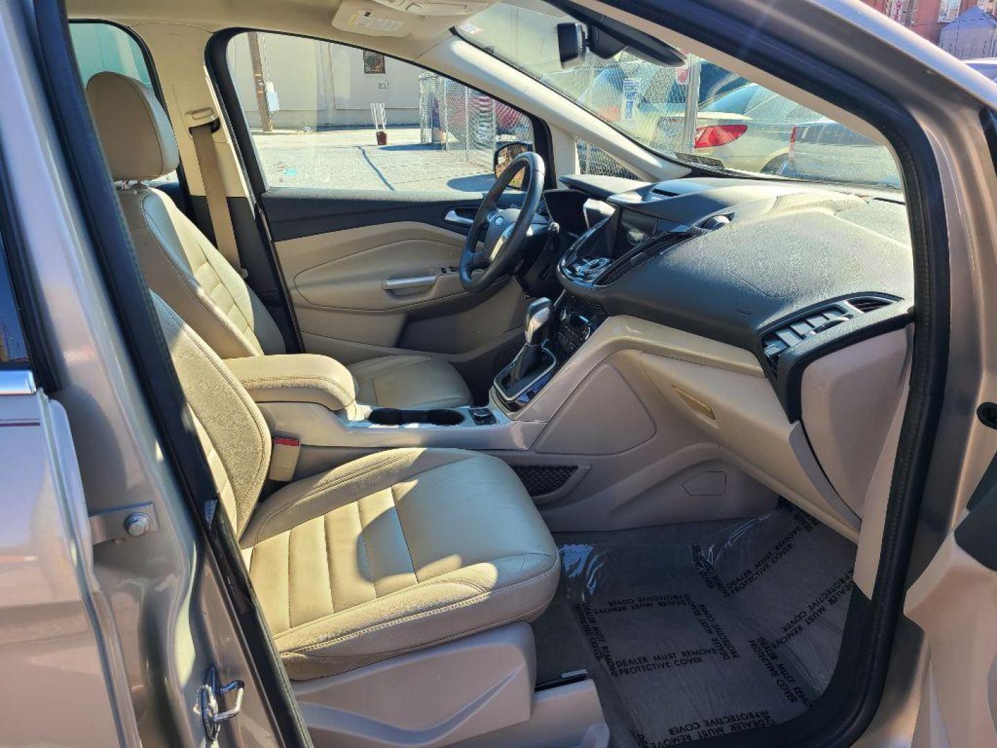 2016 TAN FORD C-MAX PREMIUM SEL (1FADP5CU9GL) with an 2.0L engine, Continuously Variable transmission, located at 7981 Paxton Street, Harrisburg, PA, 17111, (717) 561-2926, 40.261490, -76.749229 - WE FINANCE!!! Good Credit/ Bad Credit/ No Credit - ALL Trade-Ins Welcomed!!! ***Guaranteed Credit Approval*** APPLY ONLINE or CALL us TODAY ;) Internet Prices and Marketplace Prices are SPECIAL discounted ***CASH DEALS*** Retail Prices are higher. Please call us to discuss your cash and finan - Photo#8