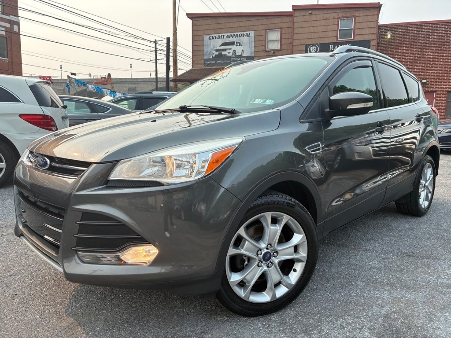 2016 GREY FORD ESCAPE TITANIUM (1FMCU9J9XGU) with an 2.0L engine, Automatic transmission, located at 117 North Cameron Street, Harrisburg, PA, 17101, (717) 963-8962, 40.267021, -76.875351- Photo#0