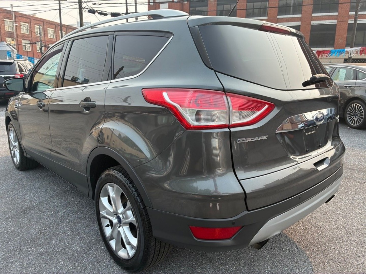 2016 GREY FORD ESCAPE TITANIUM (1FMCU9J9XGU) with an 2.0L engine, Automatic transmission, located at 117 North Cameron Street, Harrisburg, PA, 17101, (717) 963-8962, 40.267021, -76.875351- Photo#2