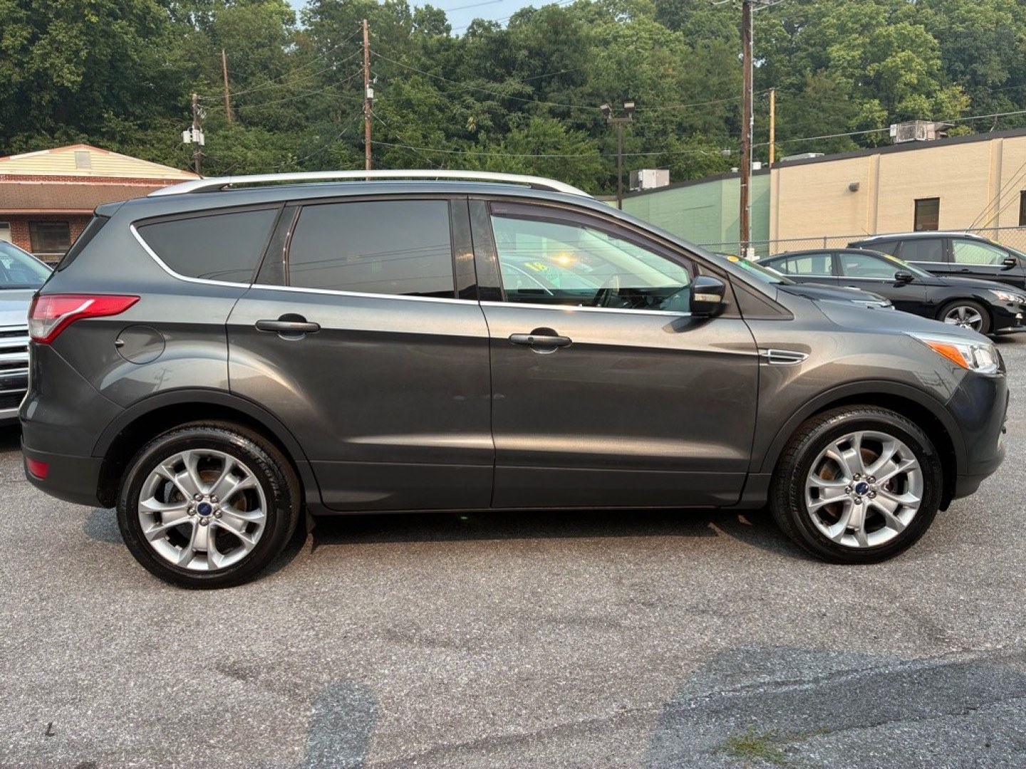 2016 GREY FORD ESCAPE TITANIUM (1FMCU9J9XGU) with an 2.0L engine, Automatic transmission, located at 117 North Cameron Street, Harrisburg, PA, 17101, (717) 963-8962, 40.267021, -76.875351- Photo#5