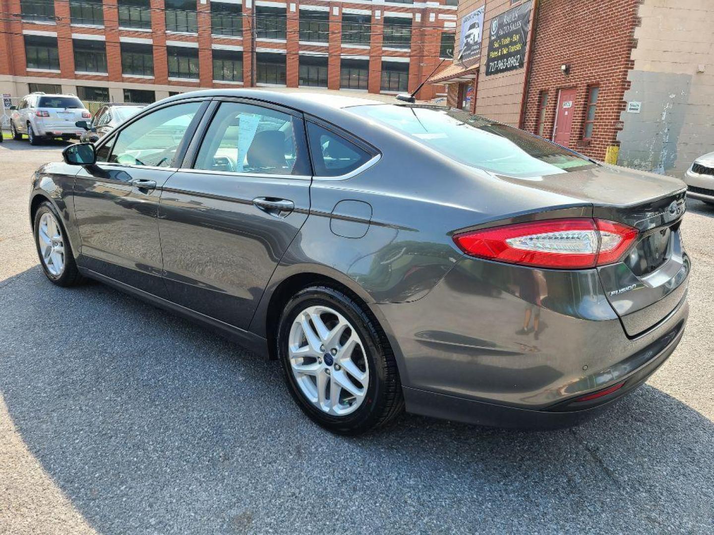 2016 GRAY FORD FUSION SE (3FA6P0H70GR) with an 2.5L engine, Automatic transmission, located at 117 North Cameron Street, Harrisburg, PA, 17101, (717) 963-8962, 40.267021, -76.875351 - WE FINANCE!!! Good Credit/ Bad Credit/ No Credit - ALL Trade-Ins Welcomed!!! ***Guaranteed Credit Approval*** APPLY ONLINE or CALL us TODAY ;) Internet Prices and Marketplace Prices are SPECIAL discounted ***CASH DEALS*** Retail Prices are higher. Please call us to discuss your cash and finan - Photo#2