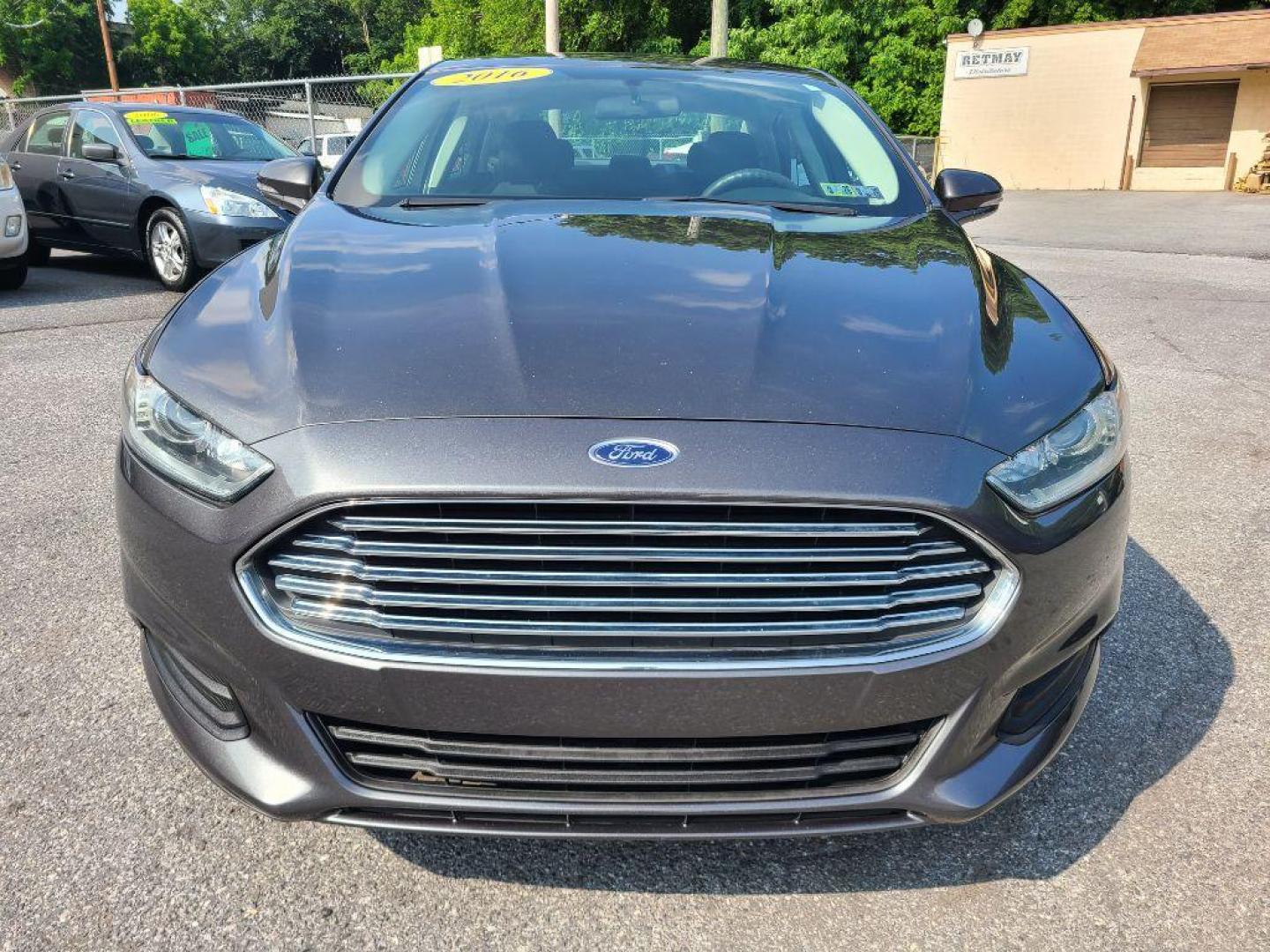 2016 GRAY FORD FUSION SE (3FA6P0H70GR) with an 2.5L engine, Automatic transmission, located at 117 North Cameron Street, Harrisburg, PA, 17101, (717) 963-8962, 40.267021, -76.875351 - WE FINANCE!!! Good Credit/ Bad Credit/ No Credit - ALL Trade-Ins Welcomed!!! ***Guaranteed Credit Approval*** APPLY ONLINE or CALL us TODAY ;) Internet Prices and Marketplace Prices are SPECIAL discounted ***CASH DEALS*** Retail Prices are higher. Please call us to discuss your cash and finan - Photo#7