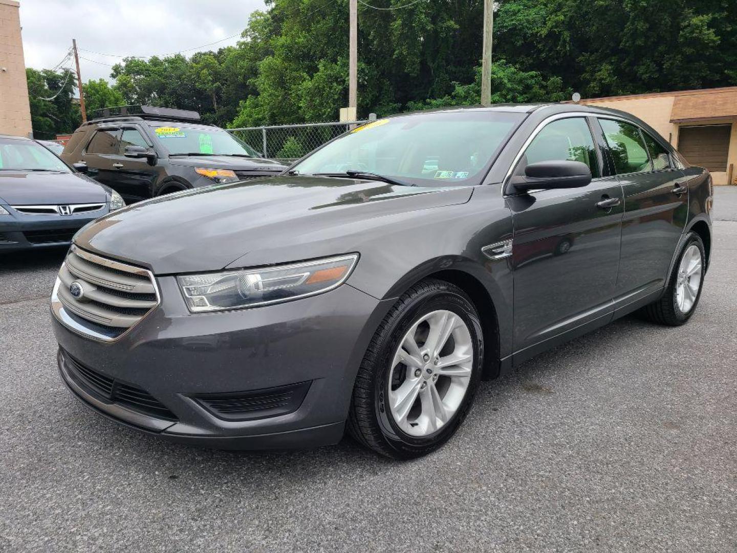 2016 GRAY FORD TAURUS SE (1FAHP2D80GG) with an 3.5L engine, Automatic transmission, located at 117 North Cameron Street, Harrisburg, PA, 17101, (717) 963-8962, 40.267021, -76.875351 - WE FINANCE!!! Good Credit/ Bad Credit/ No Credit - ALL Trade-Ins Welcomed!!! ***Guaranteed Credit Approval*** APPLY ONLINE or CALL us TODAY ;) Internet Prices and Marketplace Prices are SPECIAL discounted ***CASH DEALS*** Retail Prices are higher. Please call us to discuss your cash and finan - Photo#0