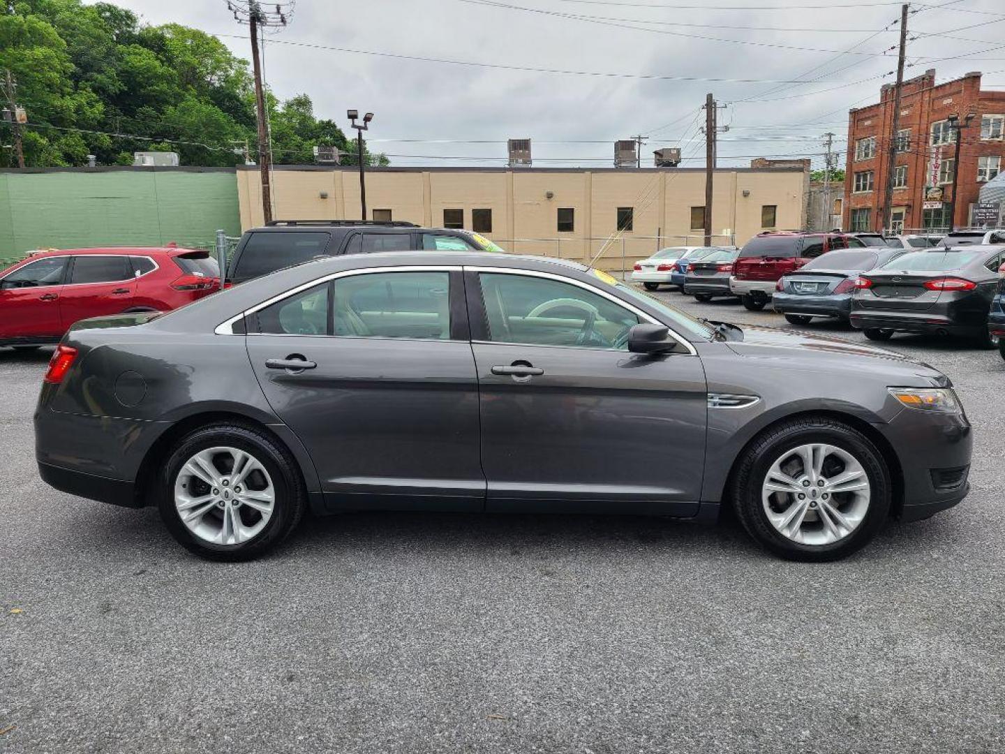 2016 GRAY FORD TAURUS SE (1FAHP2D80GG) with an 3.5L engine, Automatic transmission, located at 117 North Cameron Street, Harrisburg, PA, 17101, (717) 963-8962, 40.267021, -76.875351 - WE FINANCE!!! Good Credit/ Bad Credit/ No Credit - ALL Trade-Ins Welcomed!!! ***Guaranteed Credit Approval*** APPLY ONLINE or CALL us TODAY ;) Internet Prices and Marketplace Prices are SPECIAL discounted ***CASH DEALS*** Retail Prices are higher. Please call us to discuss your cash and finan - Photo#1