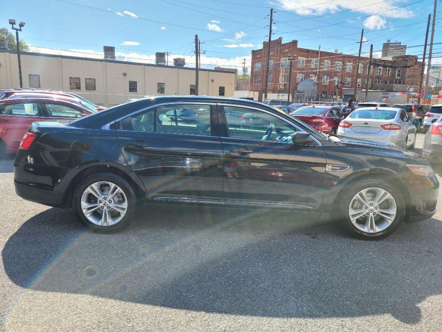 2016 BLACK FORD TAURUS SE (1FAHP2D8XGG) with an 3.5L engine, Automatic transmission, located at 117 North Cameron Street, Harrisburg, PA, 17101, (717) 963-8962, 40.267021, -76.875351 - Photo#6