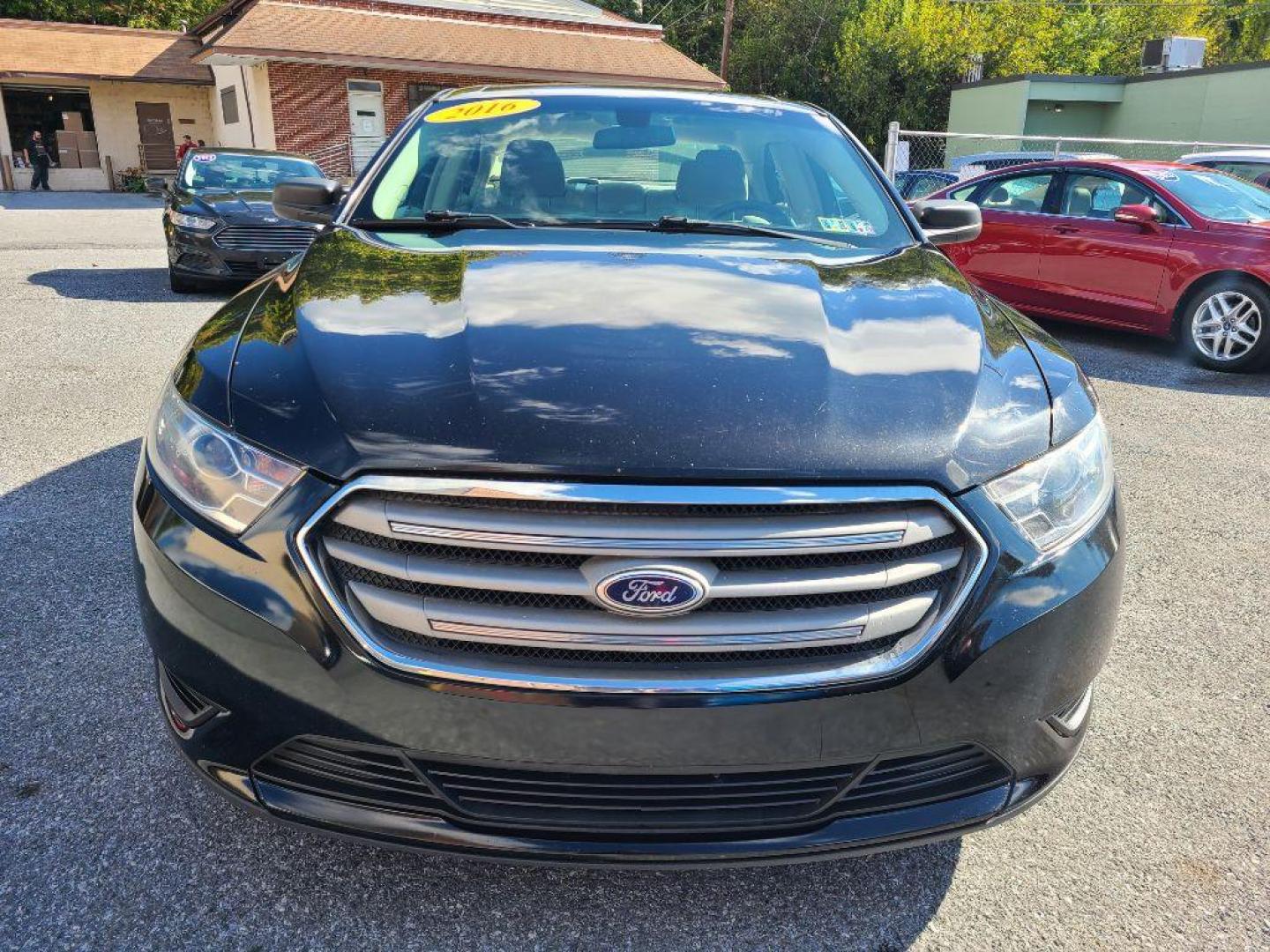 2016 BLACK FORD TAURUS SE (1FAHP2D8XGG) with an 3.5L engine, Automatic transmission, located at 117 North Cameron Street, Harrisburg, PA, 17101, (717) 963-8962, 40.267021, -76.875351 - Photo#8