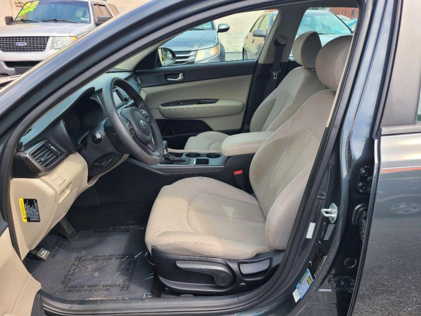 2016 GRAY KIA OPTIMA LX (KNAGT4L34G5) with an 2.4L engine, Automatic transmission, located at 117 North Cameron Street, Harrisburg, PA, 17101, (717) 963-8962, 40.267021, -76.875351 - WE FINANCE!!! Good Credit/ Bad Credit/ No Credit - ALL Trade-Ins Welcomed!!! ***Guaranteed Credit Approval*** APPLY ONLINE or CALL us TODAY ;) Internet Prices and Marketplace Prices are SPECIAL discounted ***CASH DEALS*** Retail Prices are higher. Please call us to discuss your cash and finan - Photo#8