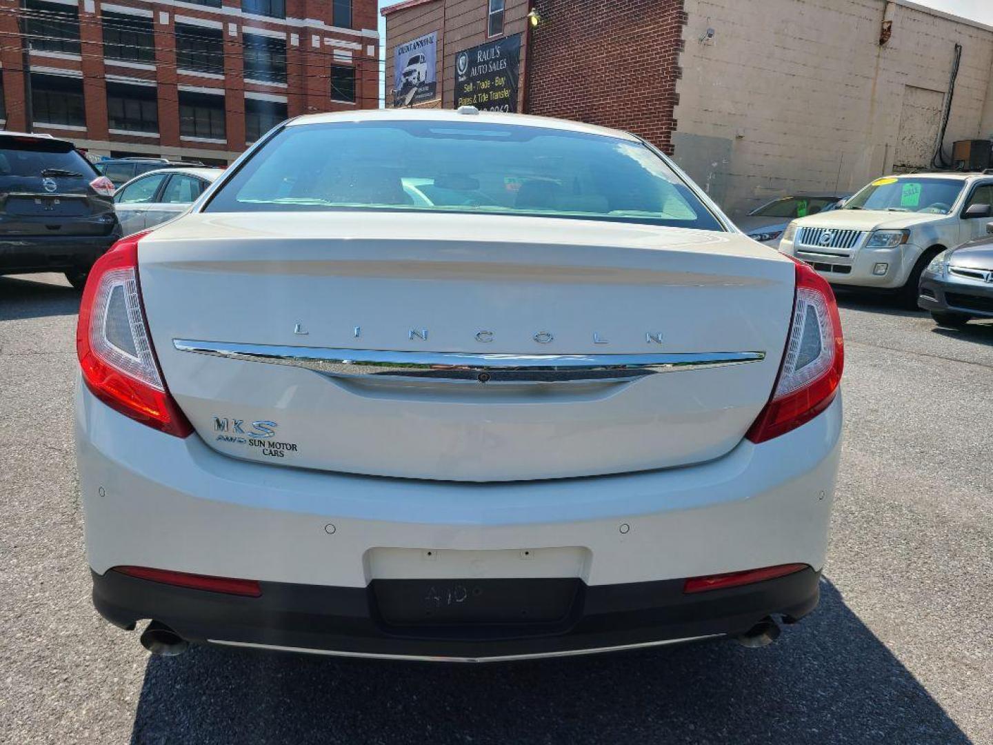 2016 WHITE LINCOLN MKS SDN (1LNHL9EK8GG) with an 3.7L engine, Automatic transmission, located at 117 North Cameron Street, Harrisburg, PA, 17101, (717) 963-8962, 40.267021, -76.875351 - WE FINANCE!!! Good Credit/ Bad Credit/ No Credit - ALL Trade-Ins Welcomed!!! ***Guaranteed Credit Approval*** APPLY ONLINE or CALL us TODAY ;) Internet Prices and Marketplace Prices are SPECIAL discounted ***CASH DEALS*** Retail Prices are higher. Please call us to discuss your cash and finan - Photo#3