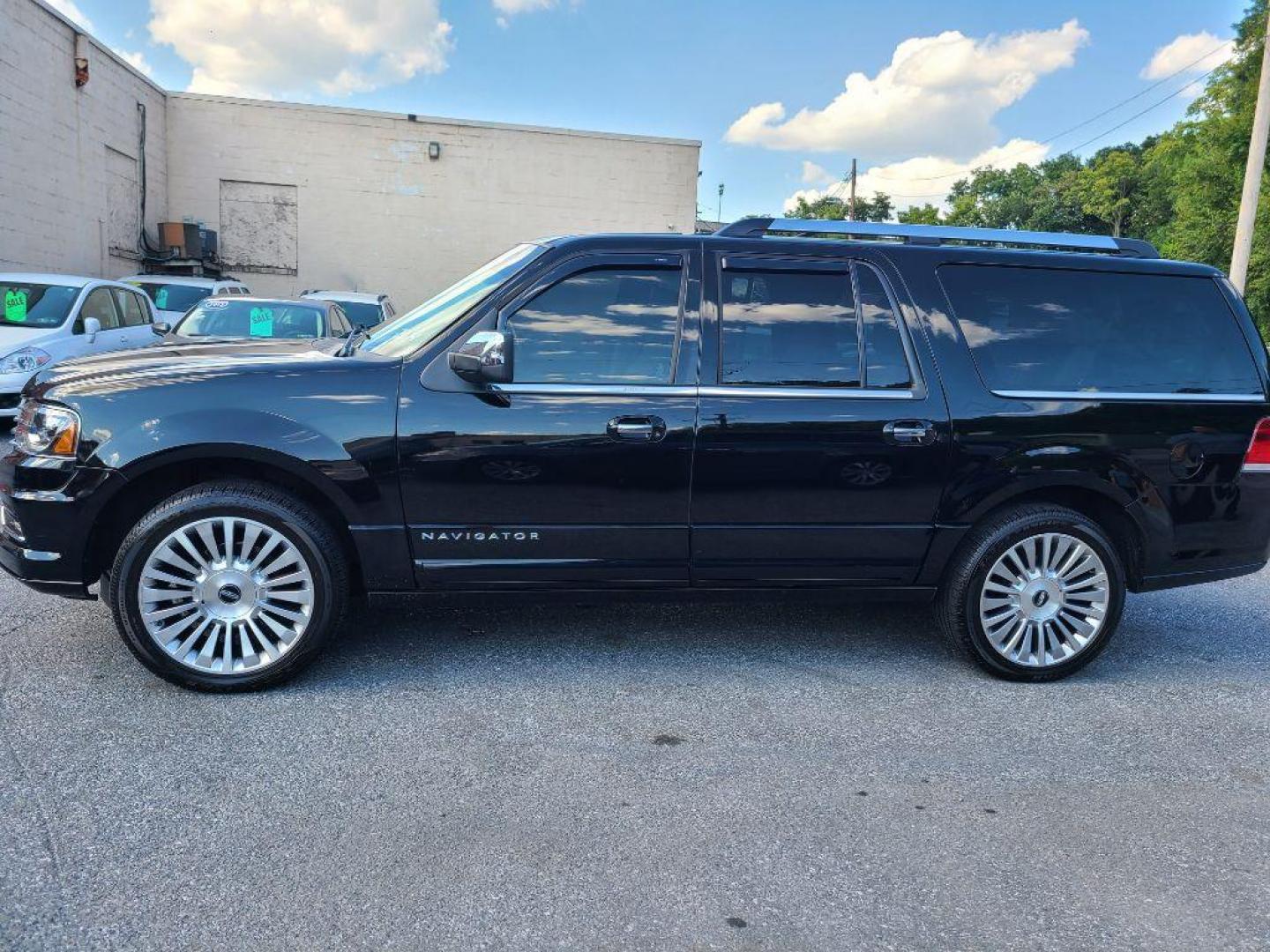 2016 BLACK LINCOLN NAVIGATOR L SELECT (5LMJJ3JT3GE) with an 3.5L engine, Automatic transmission, located at 7981 Paxton Street, Harrisburg, PA, 17111, (717) 561-2926, 40.261490, -76.749229 - Photo#1