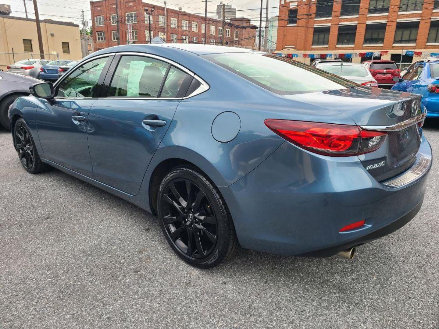 2016 BLUE MAZDA 6 TOURING (JM1GJ1V59G1) with an 2.5L engine, Automatic transmission, located at 117 North Cameron Street, Harrisburg, PA, 17101, (717) 963-8962, 40.267021, -76.875351 - WE FINANCE!!! Good Credit/ Bad Credit/ No Credit - ALL Trade-Ins Welcomed!!! ***Guaranteed Credit Approval*** APPLY ONLINE or CALL us TODAY ;) Internet Prices and Marketplace Prices are SPECIAL discounted ***CASH DEALS*** Retail Prices are higher. Please call us to discuss your cash and finan - Photo#2