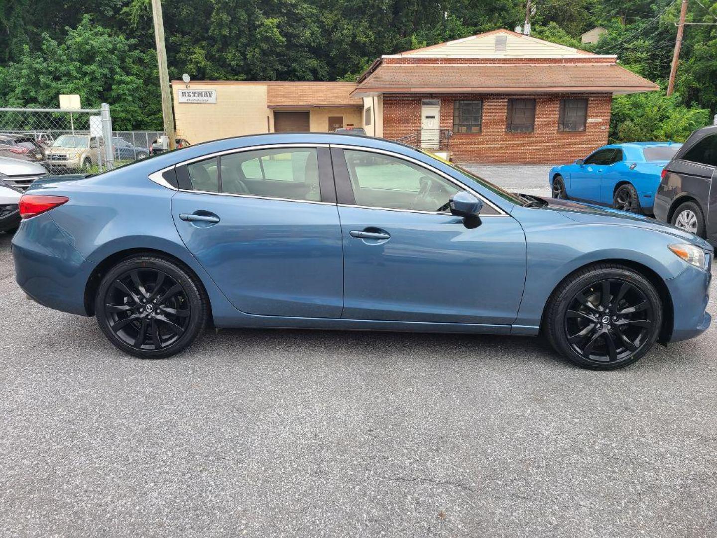 2016 BLUE MAZDA 6 TOURING (JM1GJ1V59G1) with an 2.5L engine, Automatic transmission, located at 117 North Cameron Street, Harrisburg, PA, 17101, (717) 963-8962, 40.267021, -76.875351 - WE FINANCE!!! Good Credit/ Bad Credit/ No Credit - ALL Trade-Ins Welcomed!!! ***Guaranteed Credit Approval*** APPLY ONLINE or CALL us TODAY ;) Internet Prices and Marketplace Prices are SPECIAL discounted ***CASH DEALS*** Retail Prices are higher. Please call us to discuss your cash and finan - Photo#5