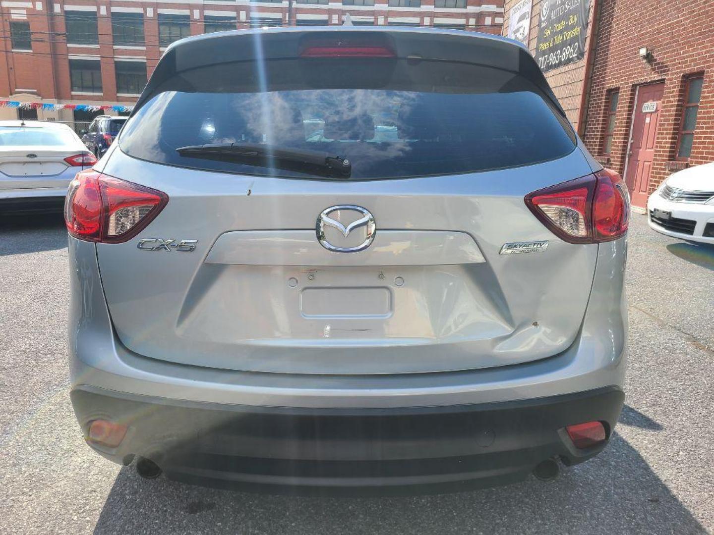 2016 SILVER MAZDA CX-5 SPORT (JM3KE2BE1G0) with an 2.0L engine, 6-Speed Manual transmission, located at 117 North Cameron Street, Harrisburg, PA, 17101, (717) 963-8962, 40.267021, -76.875351 - WE FINANCE!!! Good Credit/ Bad Credit/ No Credit - ALL Trade-Ins Welcomed!!! ***Guaranteed Credit Approval*** APPLY ONLINE or CALL us TODAY ;) Internet Prices and Marketplace Prices are SPECIAL discounted ***CASH DEALS*** Retail Prices are higher. Please call us to discuss your cash and finan - Photo#3
