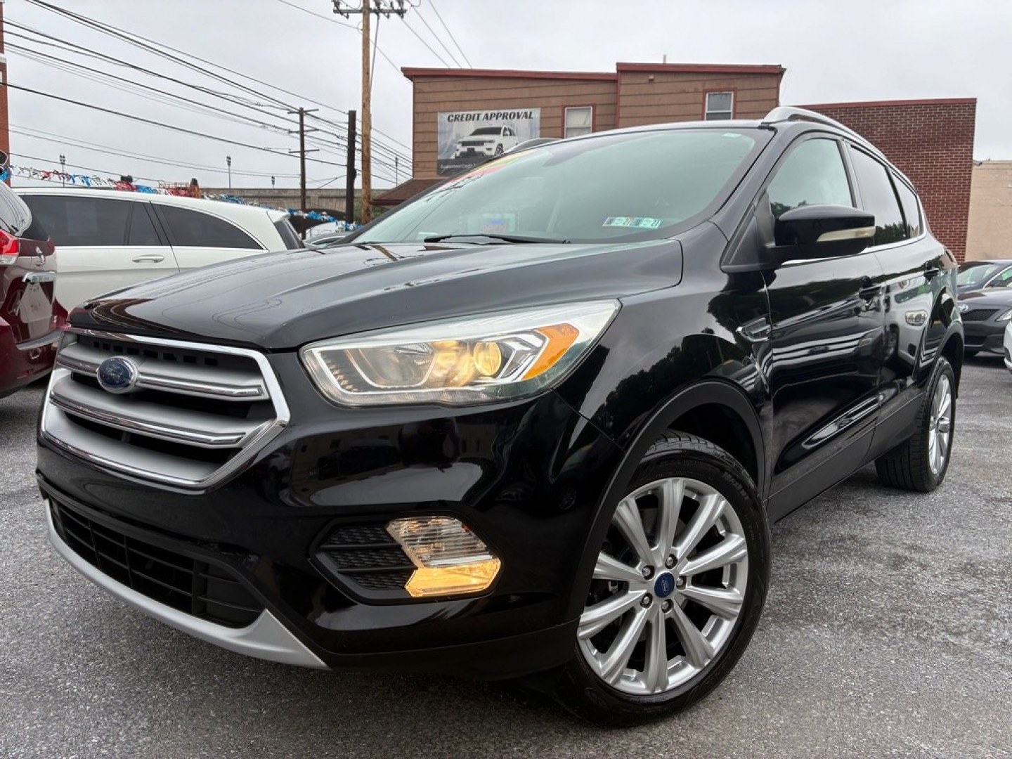 2017 BLACK FORD ESCAPE TITANIUM (1FMCU9J90HU) with an 2.0L engine, Automatic transmission, located at 117 North Cameron Street, Harrisburg, PA, 17101, (717) 963-8962, 40.267021, -76.875351- Photo#0