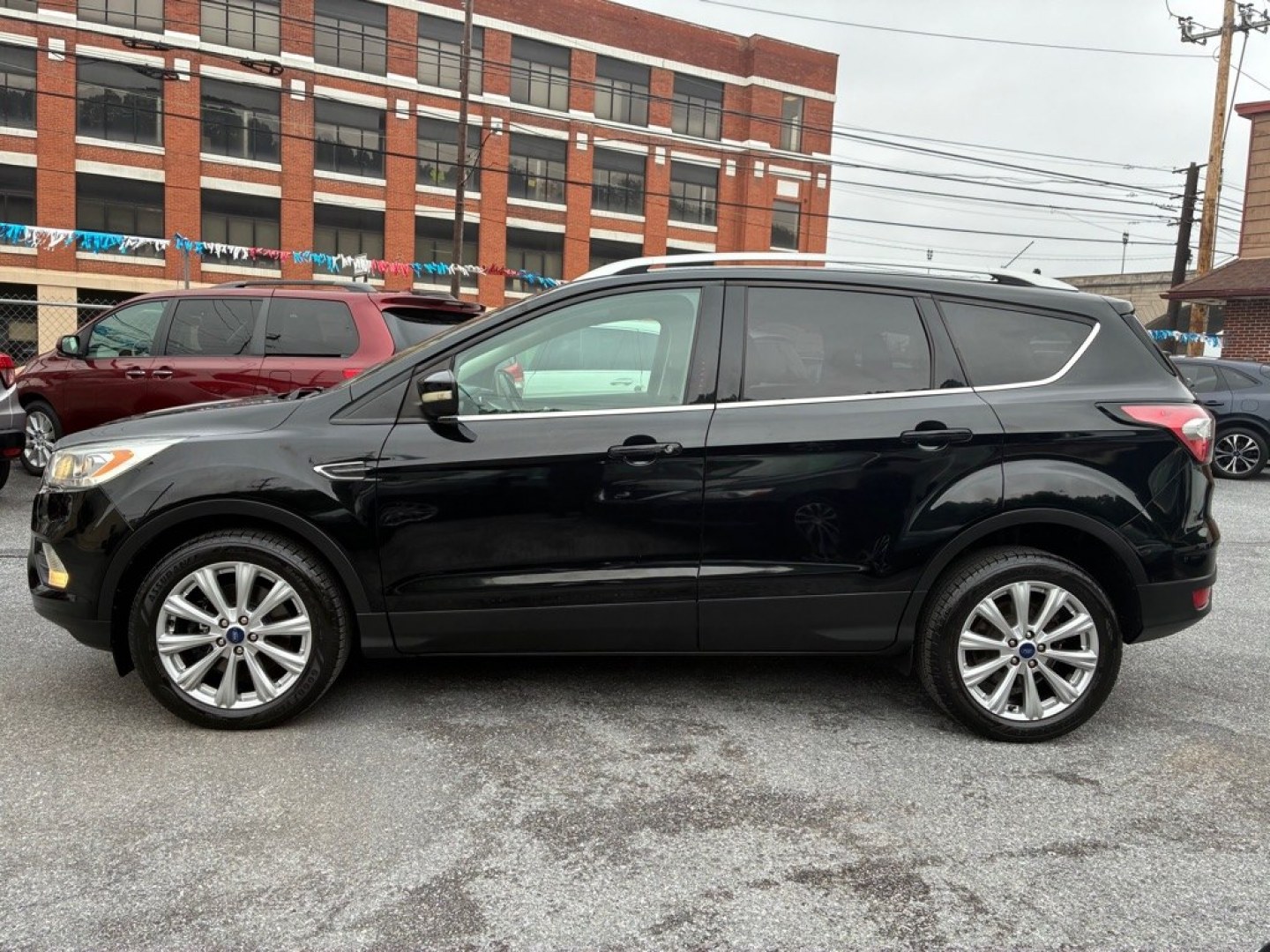2017 BLACK FORD ESCAPE TITANIUM (1FMCU9J90HU) with an 2.0L engine, Automatic transmission, located at 117 North Cameron Street, Harrisburg, PA, 17101, (717) 963-8962, 40.267021, -76.875351- Photo#1