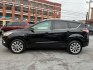 2017 BLACK FORD ESCAPE TITANIUM (1FMCU9J90HU) with an 2.0L engine, Automatic transmission, located at 117 North Cameron Street, Harrisburg, PA, 17101, (717) 963-8962, 40.267021, -76.875351- Photo#1