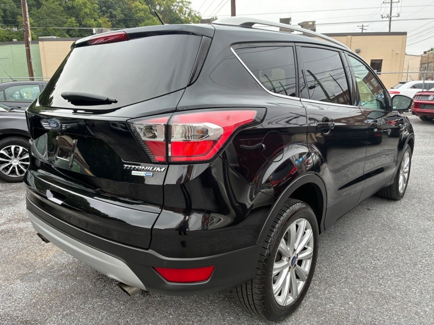 2017 BLACK FORD ESCAPE TITANIUM (1FMCU9J90HU) with an 2.0L engine, Automatic transmission, located at 117 North Cameron Street, Harrisburg, PA, 17101, (717) 963-8962, 40.267021, -76.875351- Photo#4
