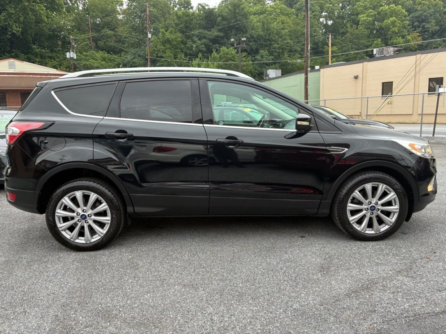 2017 BLACK FORD ESCAPE TITANIUM (1FMCU9J90HU) with an 2.0L engine, Automatic transmission, located at 117 North Cameron Street, Harrisburg, PA, 17101, (717) 963-8962, 40.267021, -76.875351- Photo#5
