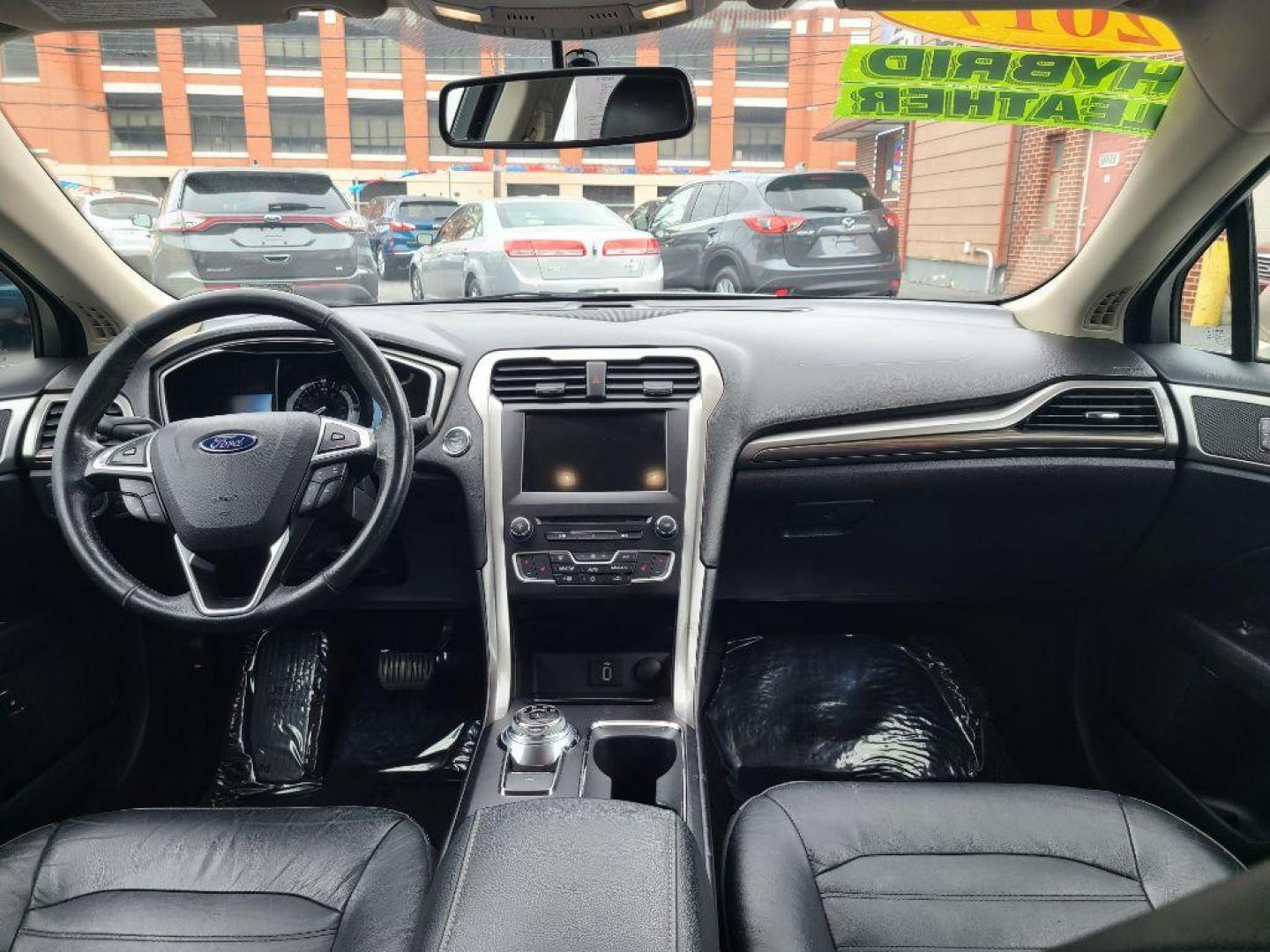 2017 TAN FORD FUSION SE PHEV (3FA6P0PU2HR) with an 2.0L engine, Continuously Variable transmission, located at 117 North Cameron Street, Harrisburg, PA, 17101, (717) 963-8962, 40.267021, -76.875351 - Photo#9