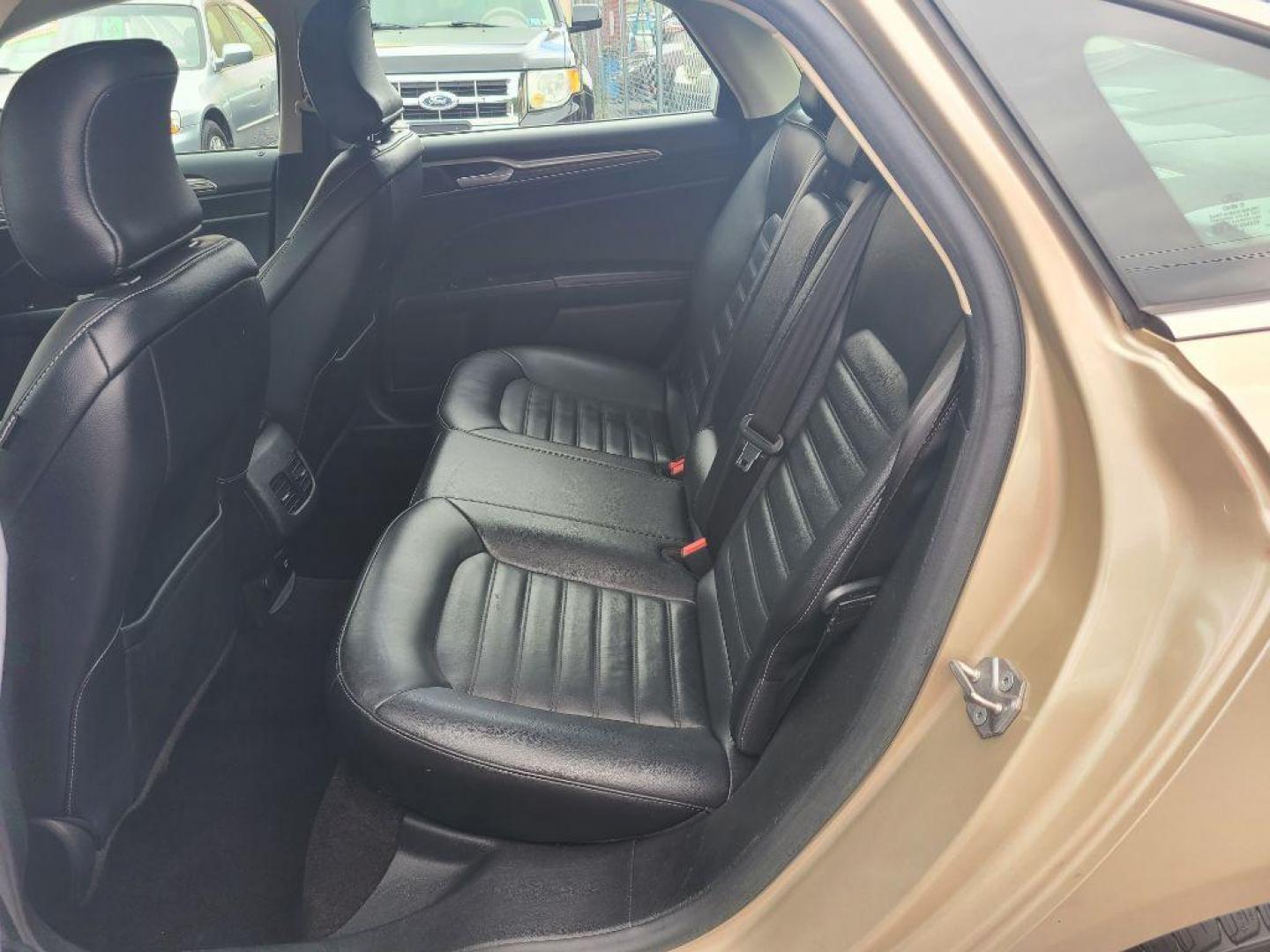 2017 TAN FORD FUSION SE PHEV (3FA6P0PU2HR) with an 2.0L engine, Continuously Variable transmission, located at 117 North Cameron Street, Harrisburg, PA, 17101, (717) 963-8962, 40.267021, -76.875351 - Photo#11