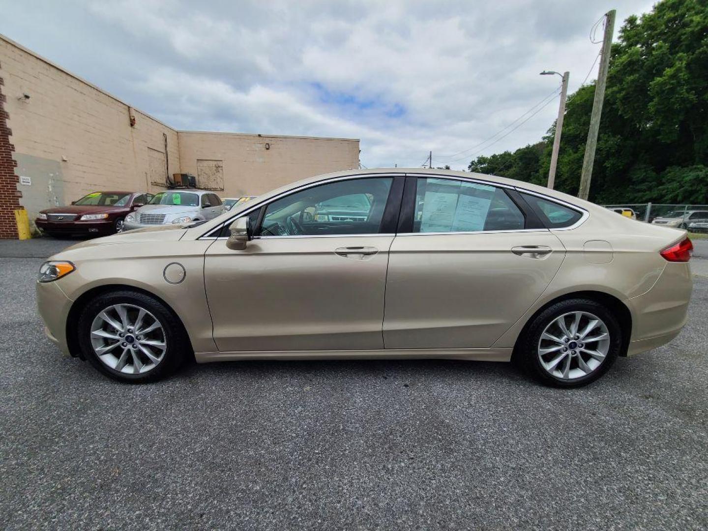 2017 TAN FORD FUSION SE PHEV (3FA6P0PU2HR) with an 2.0L engine, Continuously Variable transmission, located at 117 North Cameron Street, Harrisburg, PA, 17101, (717) 963-8962, 40.267021, -76.875351 - Photo#1