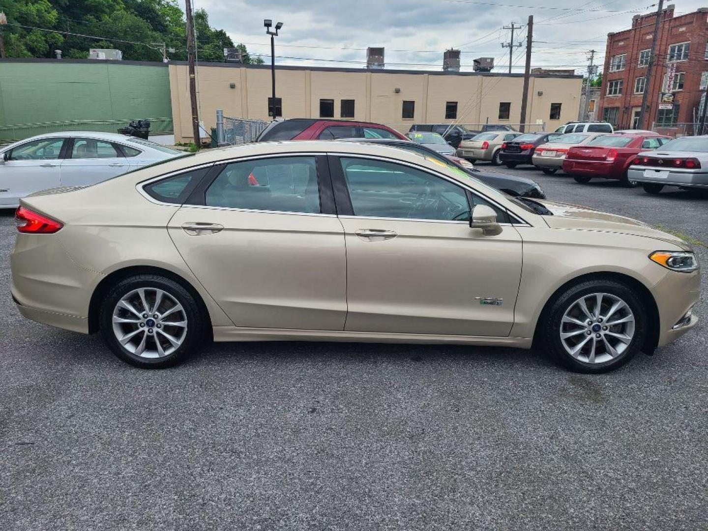 2017 TAN FORD FUSION SE PHEV (3FA6P0PU2HR) with an 2.0L engine, Continuously Variable transmission, located at 117 North Cameron Street, Harrisburg, PA, 17101, (717) 963-8962, 40.267021, -76.875351 - Photo#5