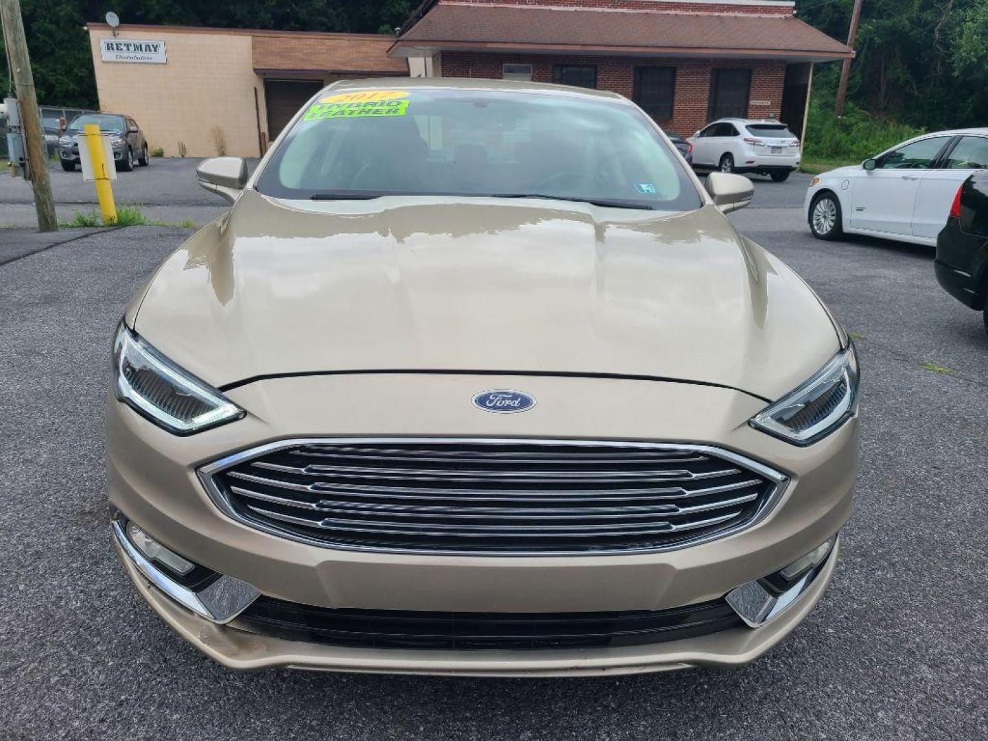 2017 TAN FORD FUSION SE PHEV (3FA6P0PU2HR) with an 2.0L engine, Continuously Variable transmission, located at 117 North Cameron Street, Harrisburg, PA, 17101, (717) 963-8962, 40.267021, -76.875351 - Photo#7