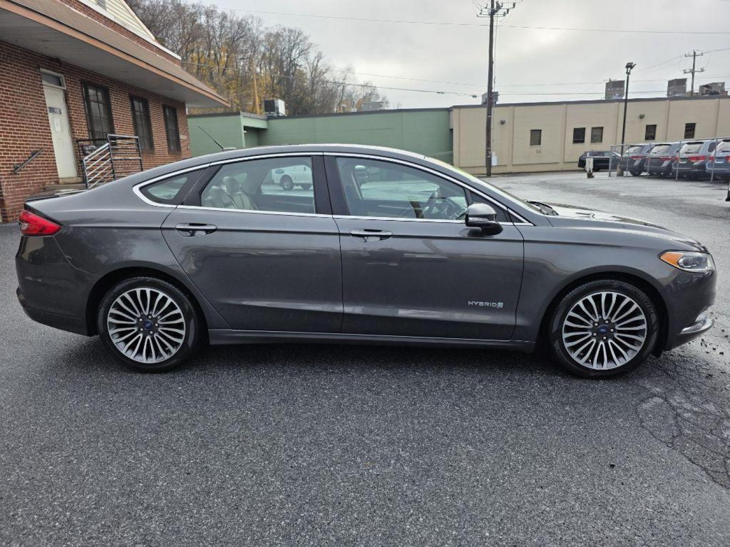 2017 GRAY FORD FUSION TITANIUM HEV (3FA6P0RU8HR) with an 2.0L engine, Continuously Variable transmission, located at 117 North Cameron Street, Harrisburg, PA, 17101, (717) 963-8962, 40.267021, -76.875351 - WE FINANCE!!! Good Credit/ Bad Credit/ No Credit - ALL Trade-Ins Welcomed!!! ***Guaranteed Credit Approval*** APPLY ONLINE or CALL us TODAY ;) Please call us to discuss your cash and financing options. - Photo#12