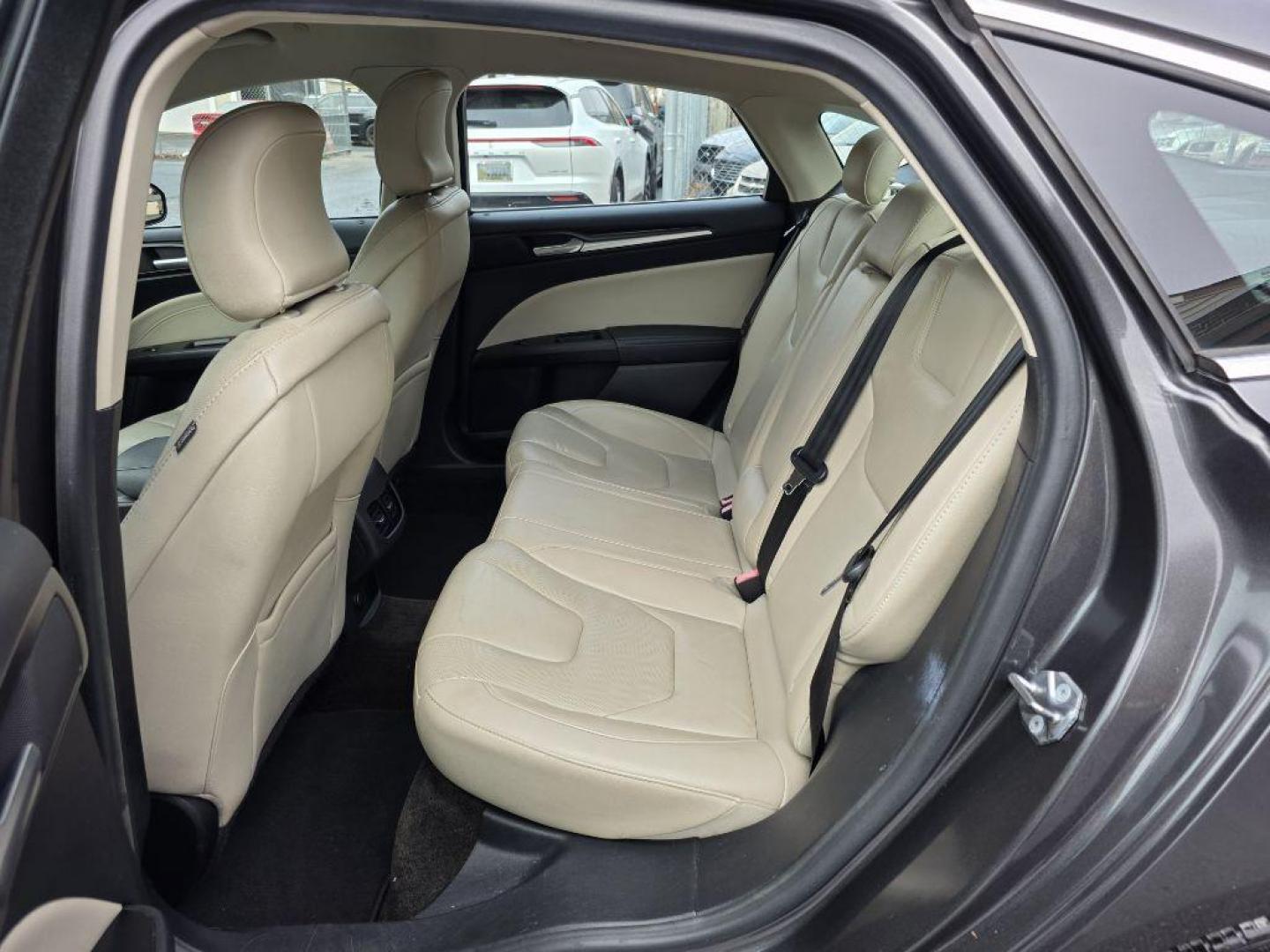 2017 GRAY FORD FUSION TITANIUM HEV (3FA6P0RU8HR) with an 2.0L engine, Continuously Variable transmission, located at 117 North Cameron Street, Harrisburg, PA, 17101, (717) 963-8962, 40.267021, -76.875351 - WE FINANCE!!! Good Credit/ Bad Credit/ No Credit - ALL Trade-Ins Welcomed!!! ***Guaranteed Credit Approval*** APPLY ONLINE or CALL us TODAY ;) Please call us to discuss your cash and financing options. - Photo#17