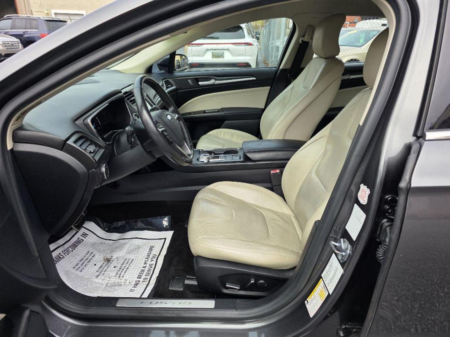 2017 GRAY FORD FUSION TITANIUM HEV (3FA6P0RU8HR) with an 2.0L engine, Continuously Variable transmission, located at 117 North Cameron Street, Harrisburg, PA, 17101, (717) 963-8962, 40.267021, -76.875351 - WE FINANCE!!! Good Credit/ Bad Credit/ No Credit - ALL Trade-Ins Welcomed!!! ***Guaranteed Credit Approval*** APPLY ONLINE or CALL us TODAY ;) Please call us to discuss your cash and financing options. - Photo#18