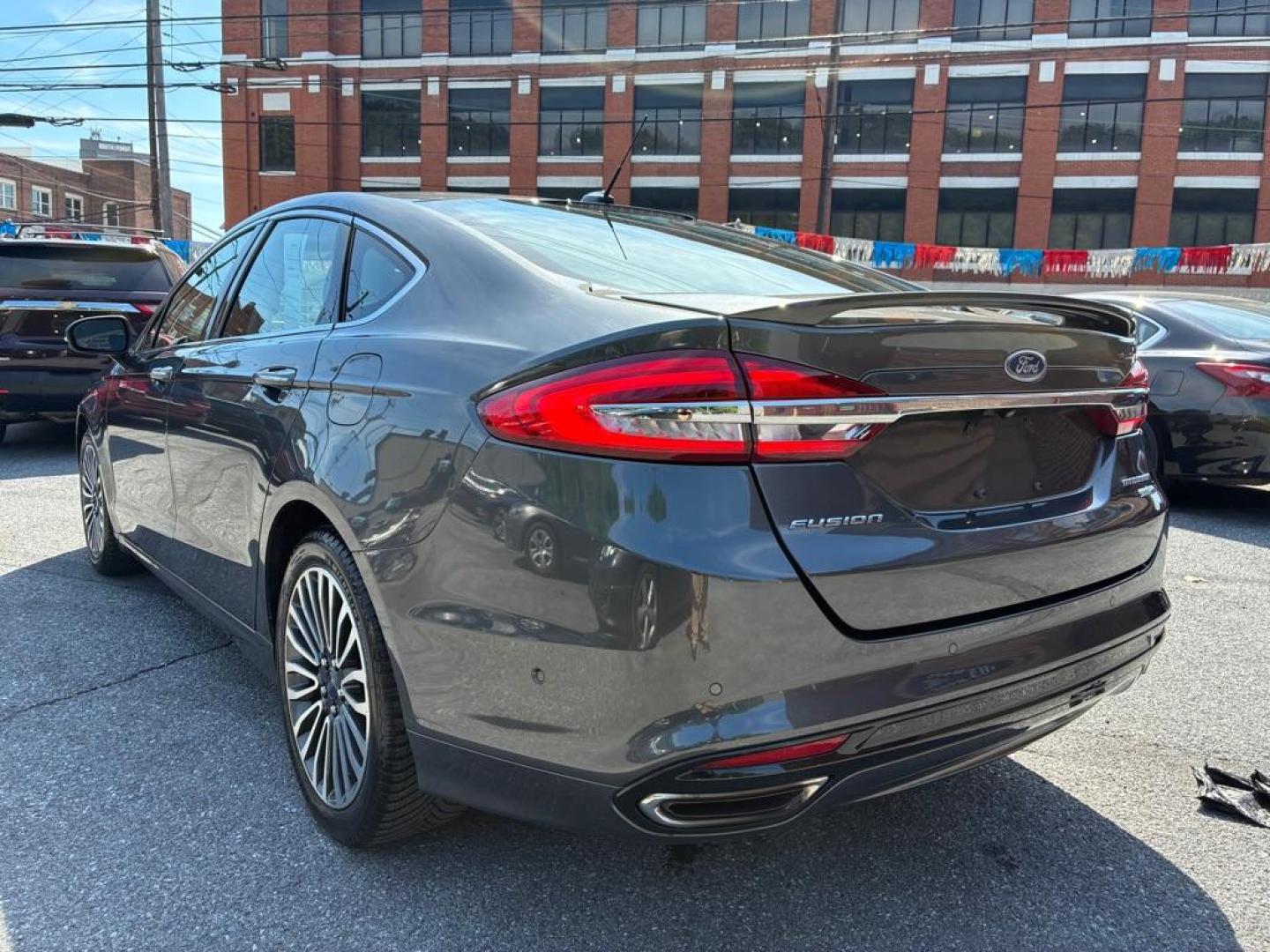 2018 GREY FORD FUSION TITANIUM (3FA6P0D93JR) with an 2.0L engine, Automatic transmission, located at 117 North Cameron Street, Harrisburg, PA, 17101, (717) 963-8962, 40.267021, -76.875351 - WE FINANCE!!! MOST vehicles are available for financing. Good Credit/ Challenged Credit/ No Credit - ALL Trade-Ins Welcomed!!! APPLY ONLINE or CALL us TODAY Please call us to discuss your cash and/or financing options. Thanks for checking our inventory! We're here to help. - Photo#2