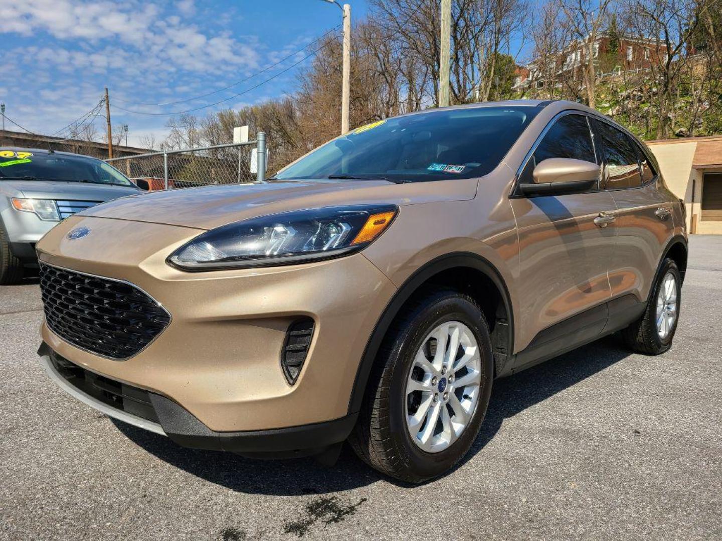 2020 TAN FORD ESCAPE SE (1FMCU9G64LU) with an 1.5L engine, Automatic transmission, located at 7981 Paxton Street, Harrisburg, PA, 17111, (717) 561-2926, 40.261490, -76.749229 - Photo#0