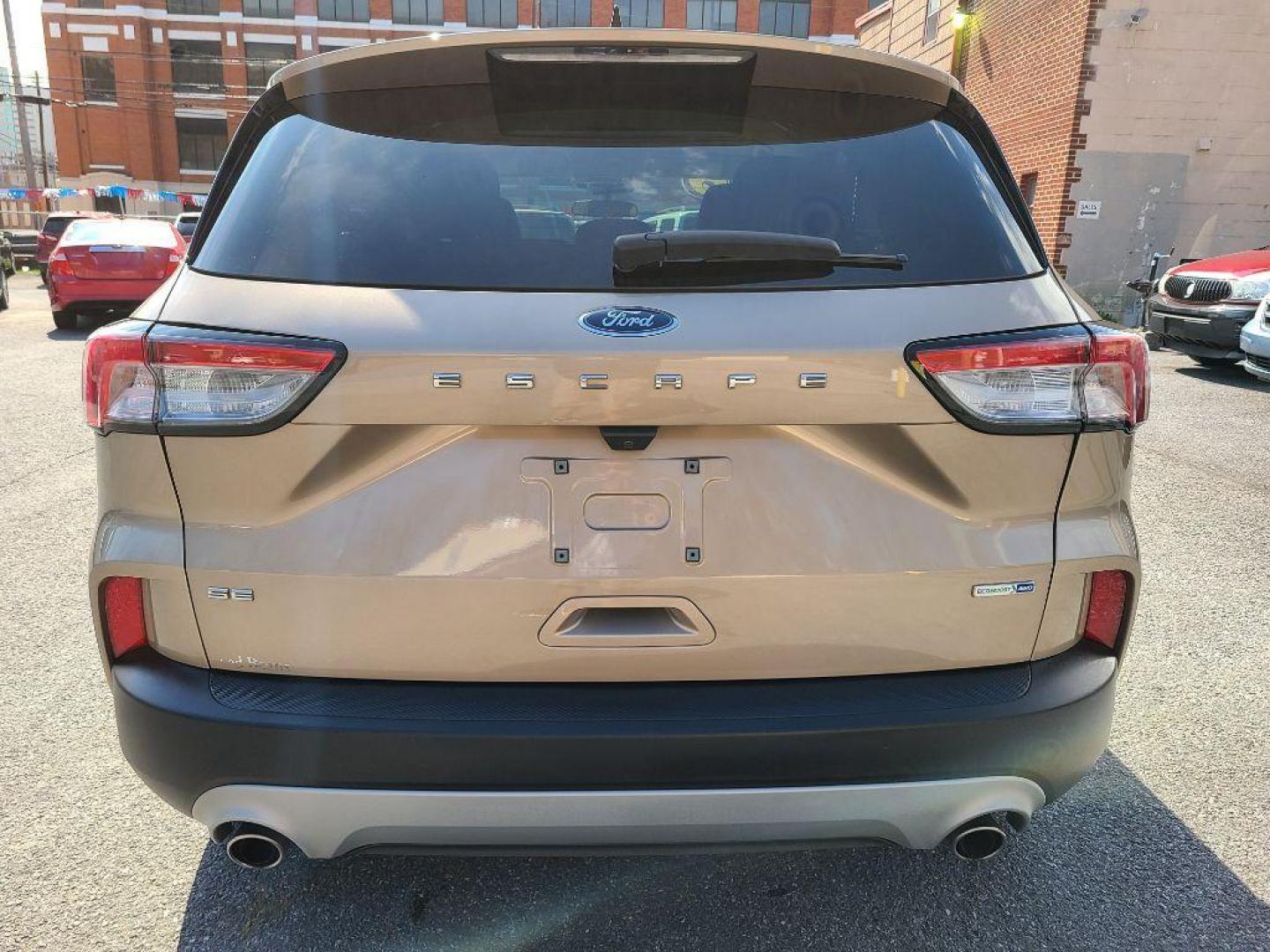 2020 TAN FORD ESCAPE SE (1FMCU9G64LU) with an 1.5L engine, Automatic transmission, located at 7981 Paxton Street, Harrisburg, PA, 17111, (717) 561-2926, 40.261490, -76.749229 - Photo#3
