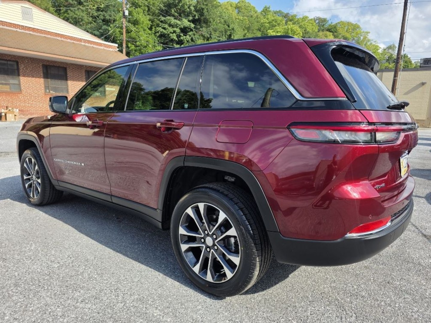 2023 RED JEEP GRAND CHEROKEE LAREDO (1C4RJHAG8PC) with an 3.6L engine, Automatic transmission, located at 117 North Cameron Street, Harrisburg, PA, 17101, (717) 963-8962, 40.267021, -76.875351 - Value Added Options - Installed Heated Front Seat Keyless Start Power Liftgate Smart Device Integration Seating Options Front Bucket Seats Rear Bench Seat Driver Adjustable Lumbar Heated Front Seat Pass-Through Rear Seat Power Driver Seat 5 Passenger Capacity Value Added Options - S- Photo#2
